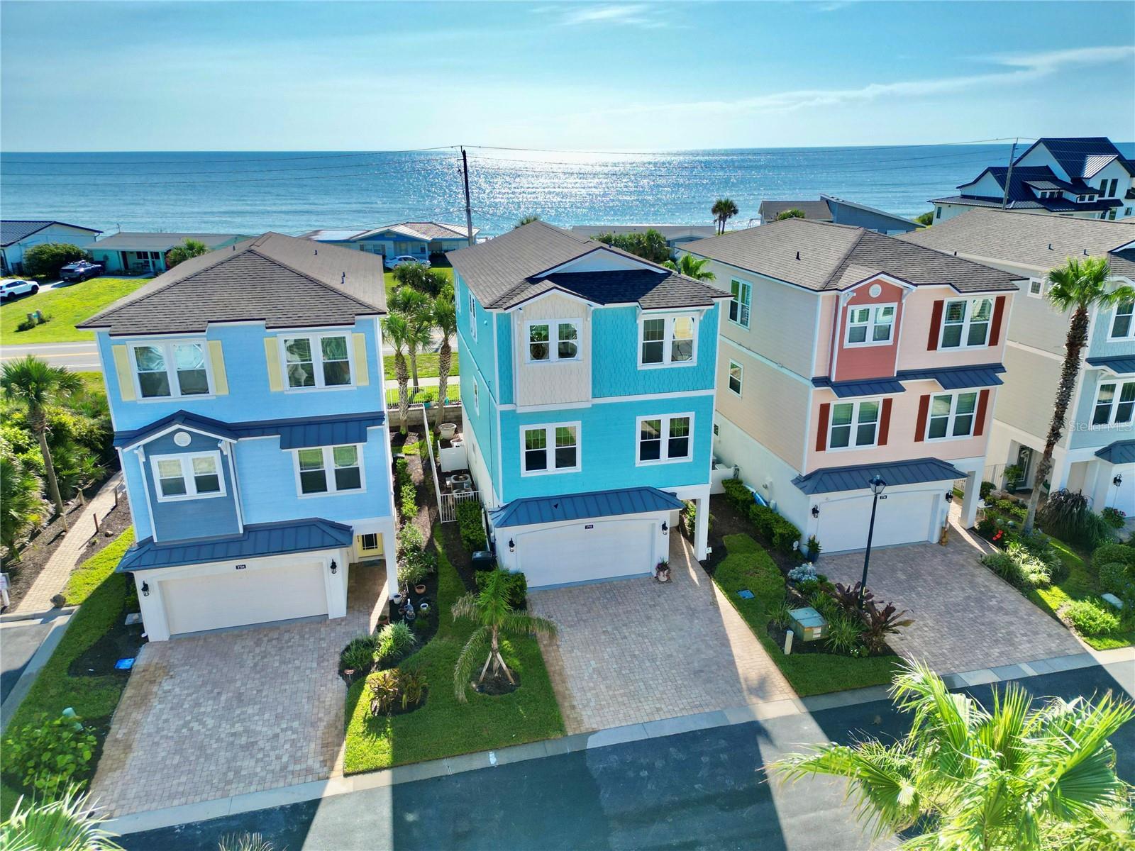 Stunning fully renovated 3-story coastal home in Sunset Inlet with elevator, ocean views, designated beach access, and private marina boat slip just off the Intracoastal Waterway. This 3-bedroom, 3.5-bath residence offers 2,799 square feet of beautifully updated living space with luxury finishes throughout, including herringbone waterproof luxury vinyl plank flooring, designer lighting, marble baths, and an incredible chef’s kitchen.

The open living areas are designed for comfort and entertaining, with built-in cabinetry, upgraded finishes, and seamless access to the outdoor entertaining area. The upper level features a beautifully appointed kitchen with a 48-inch 8-burner gas range, double oven, griddle, built-in refrigerator/freezer, microwave drawer, ice maker, wine cooler, beverage drawers, custom cabinetry, oversized island, and porcelain apron-front sink.

The primary suite captures beautiful ocean views and includes a spacious sitting area ideal for a home office or private retreat. The spa-style primary bath features marble floors and walls, a dual walk-in shower with gold fixtures, rain heads and handheld showers, freestanding soaking tub, custom vanity lighting, and designer mirrors.

Enjoy the best of the Flagler Beach lifestyle with ocean views, designated beach access, and private marina boat slip with 7,500 lb boat lift included. The property was previously HOA-approved for a pool, with pool renderings available for review. 

Recent improvements include a new roof in 2023 with spray foam insulation, exterior repaint in 2023, fenced backyard added in 2024, boat lift motor replaced in 2025, and whole-home and fire sprinkler inspections completed in May 2026. Move-in ready, beautifully renovated, and perfectly positioned for coastal living.