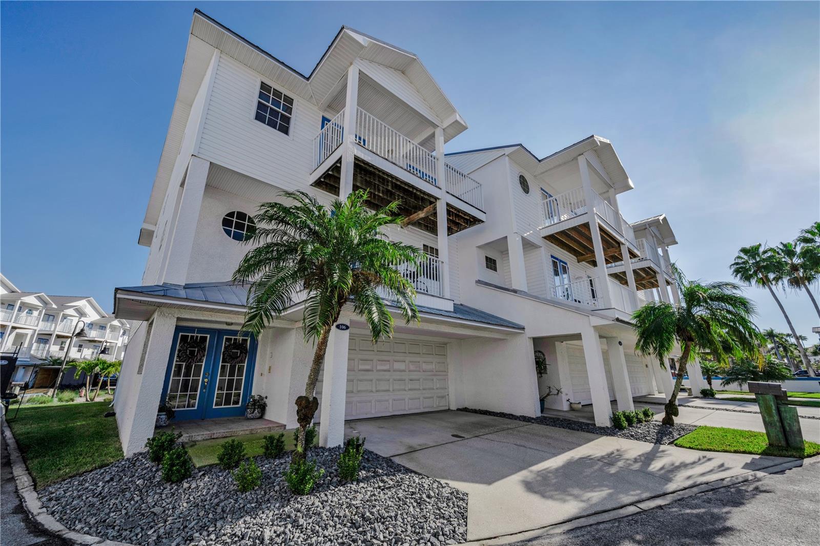 Why choose one water view when you can have two?
Double the water, double the wow. Enjoy the rare combination of gorgeous bay and poolside views from every level of this 3 story Townhouse.
This stunning end-unit offers 3 bedrooms and 2.5 bathrooms in the sought-after gated community of Tides Village Yacht Club in North Redington Beach. Step right outside your door and enjoy access to the bay waterfront to your left or the heated community pool and spa to your right. Every level of this townhouse has a balcony, so those views are always with you as you enjoy each floor. The balconies set up the perfect setting for relaxing or entertaining all day long. Inside, the open floor plan seamlessly connects the living, dining, and kitchen areas, while still maintaining clearly defined areas and hard wood floors throughout. The spacious primary bedroom features a private en-suite bathroom with a luxurious heated jacuzzi tub and a walk in closet. Additional highlights include a central vac, trash compactor,  Elevator, a bonus room (500+ sf) 2-car garage with a large bonus space and a newer 2025 AC system for peace of mind. All of these amenities without ever leaving the gates, but when you do, enjoy Redington Beach where restaurants and shopping are a plenty. 
This is a rare opportunity to enjoy waterfront living with convenience, privacy, and resort-style amenities.