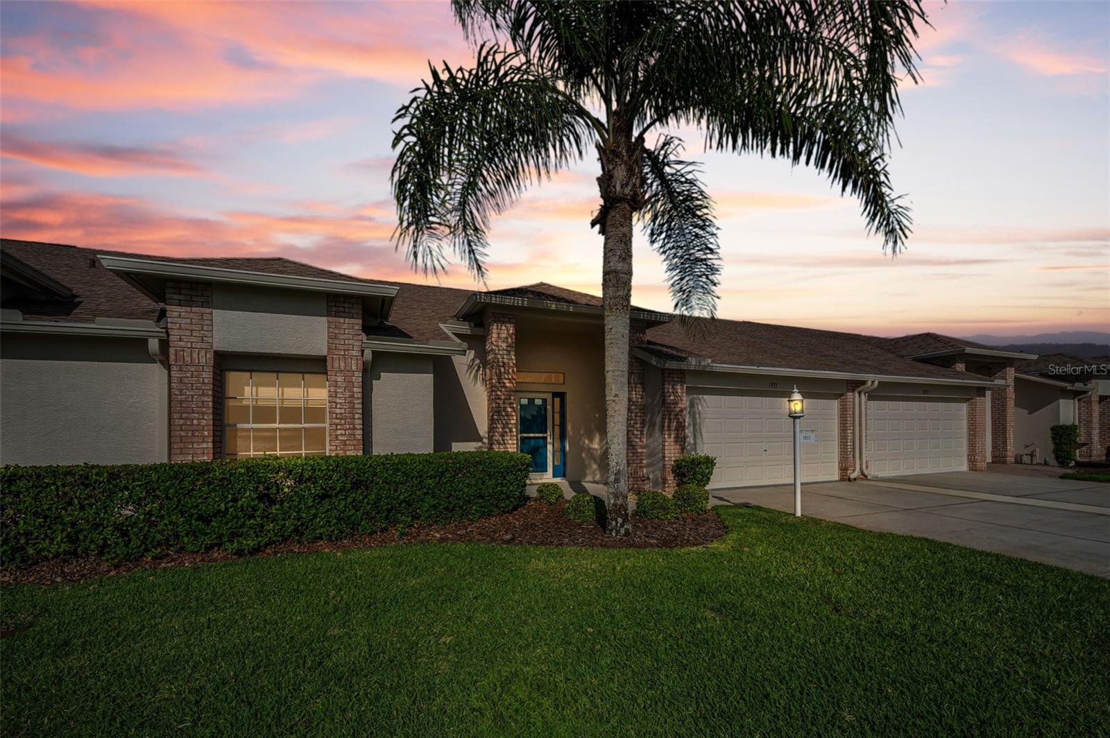 Pride of ownership shows in this 2 Bedrooms, 2 Full Baths, 2 Car Garage Villa with a view of the Ponds!  Once you arrive you will notice the lush landscaping that brings you to the front door that has glass side panels for natural light.  Once inside the foyer you have a closet, soaring ceilings and designer style luxury wide plank vinyl flooring throughout for easy care.  The living & dining rooms makes entertaining easy with plenty of room for those holiday meals.  This kitchen has white cabinets that are soft closing, pot drawers, pantry cabinet w/pullout shelves, spice racks, closet pantry, stainless steel appliances, quartz countertops w/breakfast bar and a wonderful breakfast nook area to enjoy the view. The Primary bedroom has two walk in closets, ceiling fan and the primary bathroom has wood vanity w/drawers, linen closet, walk in shower w/glass enclosure.  There is a hallway w/linen closet to the guest bathroom that has wood vanity w/drawers and tub w/shower.  The guest bedroom has ceiling fan and a large walk in closet.  The sliders in the living room lead you to the den/office with newer double pane windows.  The laundry room has washer, dryer, cabinets, shelving & sink. The garage a has pull down staircase to attic.  This home offers a tranquil view of the ponds across the street and in the backyard that you and your guest will enjoy!  Newer items are roof, water heater, a/c system, water softener.  This gated community offers many events and activities that your social calendar will always be full!  Heritage Springs offers a golf course, tennis courts, pavilion w/picnic tables, grills, bocce, shuffleboard, horseshoes, club house w/restaurant & lounge, performing arts center, game room, billiards room, arts & crafts room, library & computer room, heated pool & spa, fitness center.