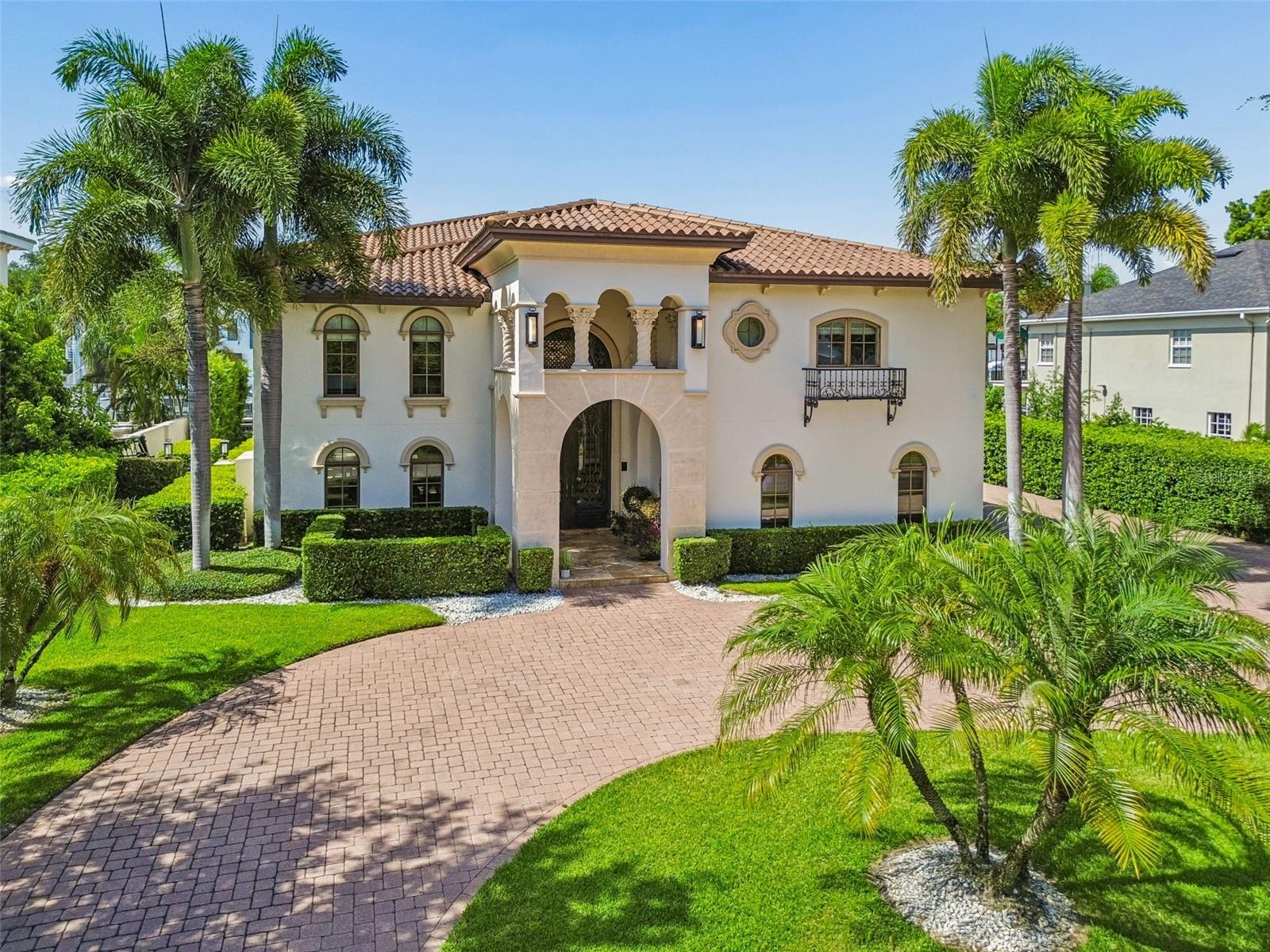 Welcome to 4927 Lyford Cay Road, an exceptional 6699 sf modern European inspired waterfront showplace set on the 
Grand Canal of Culbreath Isles, 5 houses from the open bay.  This beautifully updated home features a dramatic foyer entry, open floor plan, 3 car side entry garage, 5 spacious bedrooms, media room and wine room.  The well appointed chef's kitchen has 2 large islands, eating area, top of the line appliances including 2 Sub-Zero refrigerator/freezers, 2 Miele dishwashers, Wolf 6 burner gas range, and a Miele coffee maker. The primary suite has extraordinary his and her closets, large spa like bath, fireplace and a private verandah overlooking the water.  A secondary staircase leads to the theatre room that will provide entertainment for family and friends.  Outdoor an expansive patio provides shaded seating with fireplace and tv's to catch sporting events while grilling at your outdoor kitchen and then take a dip in your heated pool and spa.  For all your boating needs there is a 10 x 24 ft dock with a 16,000 lb and a 7,000 lb boat lift.  Enjoy the luxury of living in Culbreath Isles, Tampa's top guarded and gated community, located minutes to famous Tampa International Airport, top[ rated public and private schools, world class shopping and dining at International Plaza, the business districts of Westshore, Midtown and Downtown, and the Nation's Top Beaches. You can have it all!