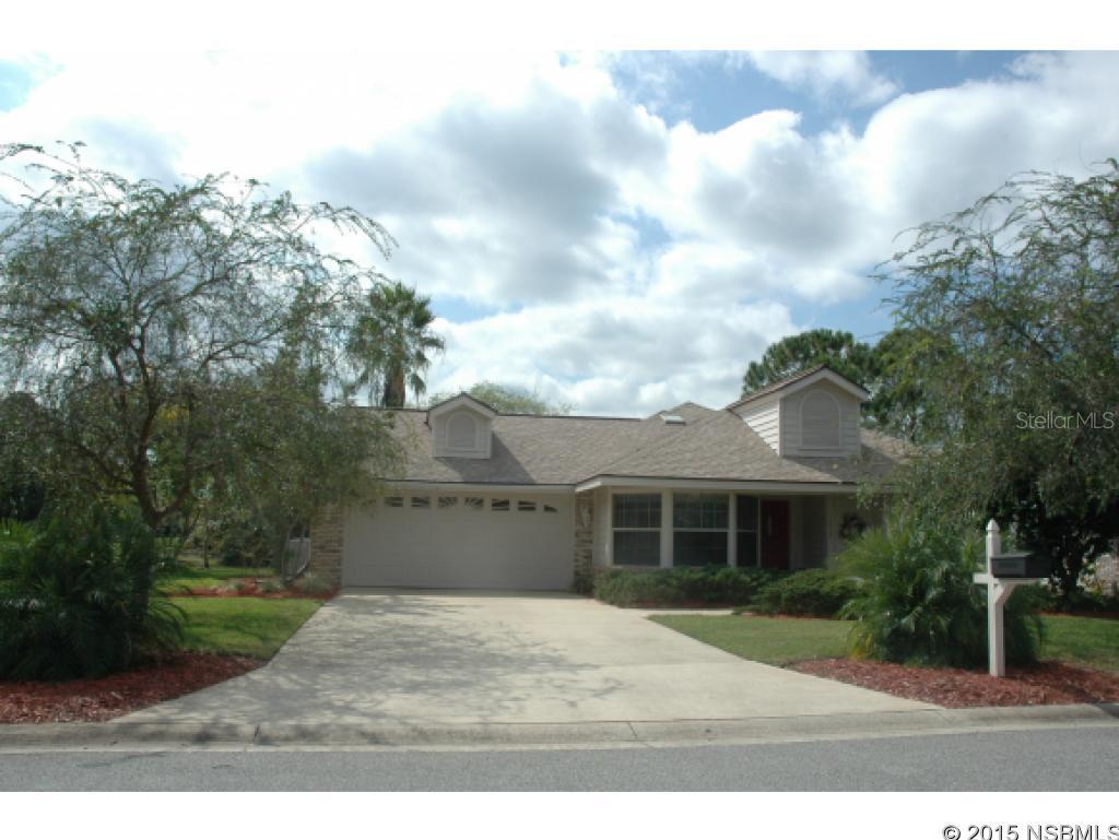 PANORAMIC views of the surrounding adjoining lakes and golf course are the magnificent backdrop to this desirable  ranch home! Located on a cul-de-sac in the prestigious Spruce Creek Fly-In community, this picturesque Turtle Pointe home with maintenance-free brick front exterior accents, plus an open floor plan featuring a Dining Area & Great Room with a vaulted ceiling, wood-burning fireplace & 2 sets of sliding glass doors opening to the large outdoor patio & screened Lanai. The eat-in Kitchen features a large Casual Dining/Breakfast Nook with Bay Window, a pass-thru to Dining Area, plus newer range & refrigerator. Master Bedroom Suite features sliding glass doors to the screened Lanai, an upgraded shower & walk-in closet. The 2nd Bedroom has French Doors & walk-in closet. Other features include a new water heater in 2015 and a ''whole house'' Generator. The Spruce Creek POA fee for 2015 is $1,400 & covers 24-hour security, maintenance of streets,  taxiways, private airport, children's playground & overlook park & common areas.  This is the opportunity to own a home with awesome, unobstructed waterfront views. Located minutes from medical facilities, restaurants, shopping & theater, 20 minutes to Embry Riddle Aeronautical Univ. & 1 hour to Orlando. This private/gated community offers championship golf, pool, tennis, fitness center at the Spruce Creek Country Club (with membership opportunities still available), salon & restaurants. Residents can literally fly home to their private gated air park, golf, play tennis, or dine at their country club then drive a short 7 miles to the World Famous Daytona Beach. ;Water: City