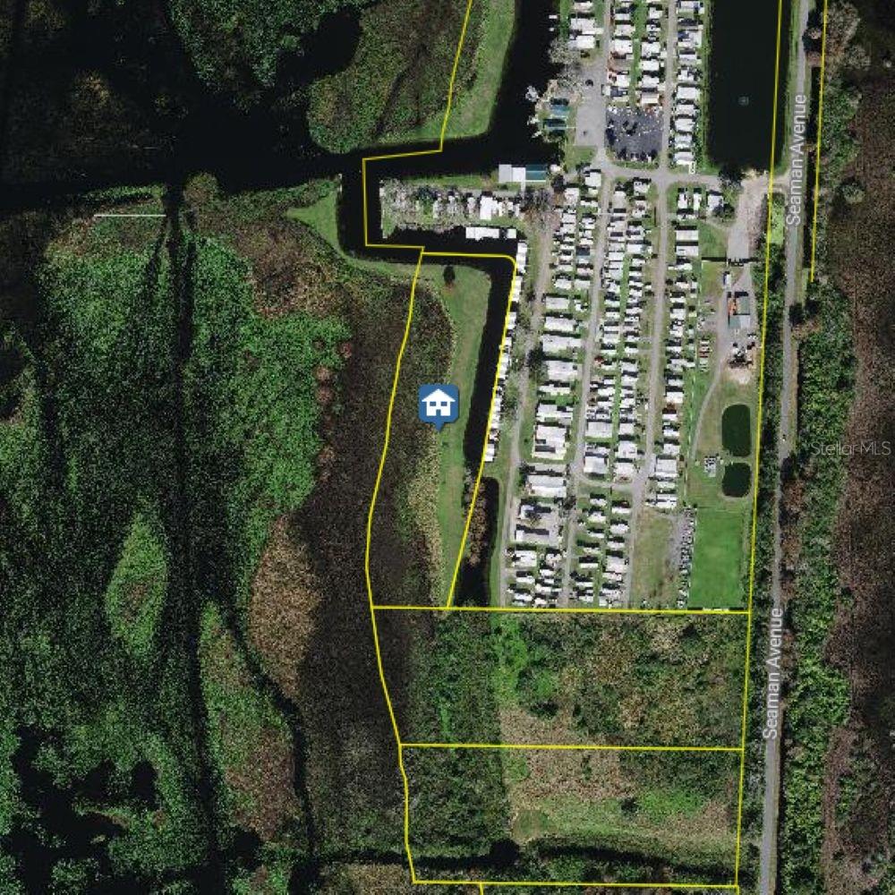 Lakefront Parcel on West Lake Toho. Rare opportunity to buy and plan for the future. Limited access
currently. Great location at the end of Kissimmee Park Road and Seaman Avenue. See photos for details.
5.26 Acres with 787 feet on the waterfront.