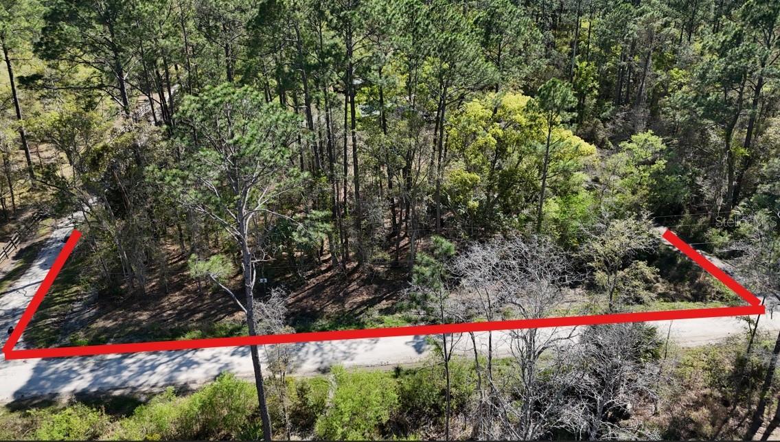 Beautiful 1.20 acre property located in a quiet rural community perfectly situated between Ocala and Gainesville. This listing consists of two adjacent lots (.60 acres each), with plenty of space to enjoy country living. ONLY 5 minutes to Citra. Approximately 25 minutes to downtown Ocala. Approximately 30 minutes to Gainesville. Close to convenience stores and gas stations. This property is R4 ZONING which allows for multiple uses, including: Site-built homes and mobile homes. Plenty of space for your lifestyle. Bring all of your toys (Rv's, boats, golf carts). Room for your garden and your pets to run free. This property would be great for a primary residence or just a weekend retreat. Grab these two lots and start enjoying peaceful country living while still being close to town.