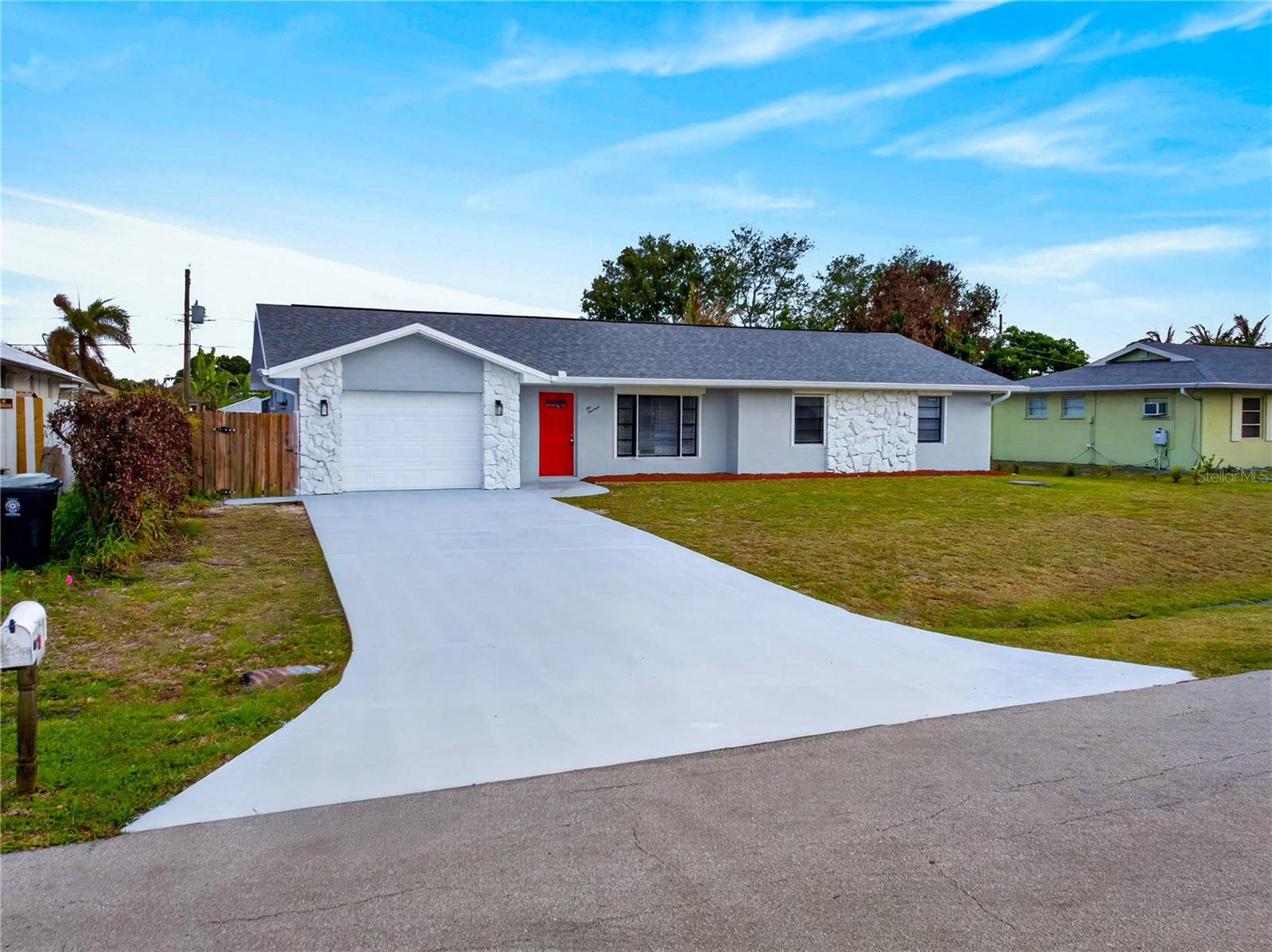 Come see this gorgeous and open concept pool enclosure home located in an outstanding location! Just off the Crosstown Bridge; making any commuting smooth and easy with major roads such as; US1, I 95 and the Turnpike all nearby. This place has been beautifully remodeled with brand new white shaker kitchen cabinets, quartz countertops with backsplash and newer Stainless Steel appliances. It also comes with brand new waterproof luxury vinyl planks throughout the entire house, brand new vanities and faucets, new tile, new toilets, mirrors and hardware in both bathrooms. All new ceiling fans, lamps, switches/outlets throughout the whole house. It's been freshly painted inside/out; including epoxy paint in the garage floor, driveway, back porch and pool deck. This place is completely fenced in for privacy and it comes with a newer roof, A/C unit and newer owned solar panels system (paid-off); offering long-term durability and energy efficiency. The back porch and pool deck has a breathtaking size ideal for family and friend gatherings. This home is move-in ready, so schedule your showing today as it won't last long! *All the information and measurements in this listing are approximate and need to be corroborated by the buyer's agent*.