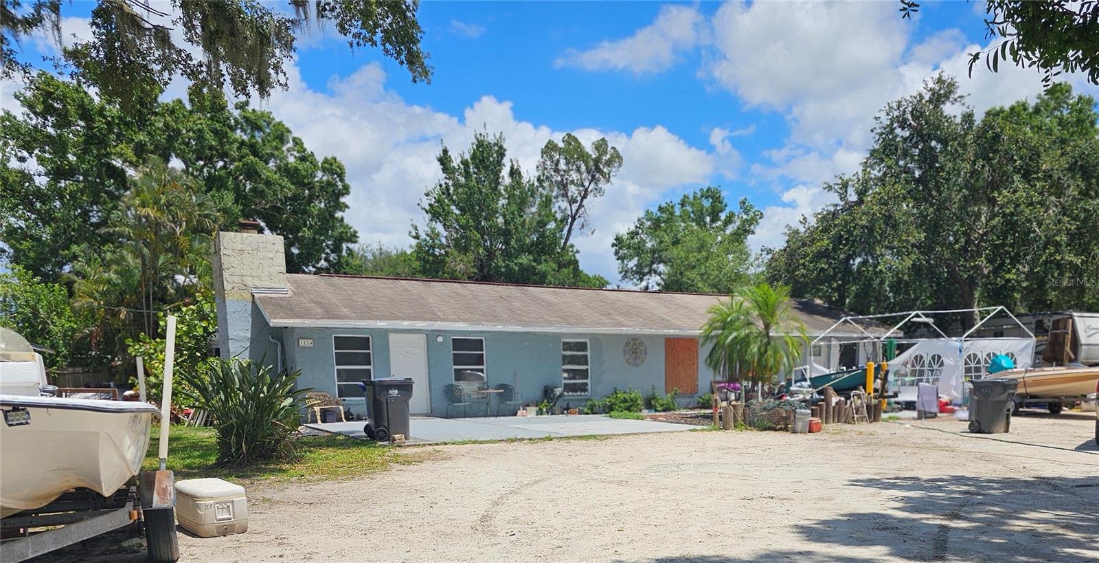 POTENTIAL FOR REZONING WITH MOFFITT CANCER CENTER JUST DOWN THE STREET! Plenty of room in this wonderful property with in-ground pool. It can be utilized as a duplex or a mother-in-law suite would be a blessing to the right person. This great location is close to Highway 674 and I 75 huge 145‘ x 208‘  corner property ,this easy location is a short walk to bus stop. Some TLC and cleanup will bring this Diamond back to shine again.