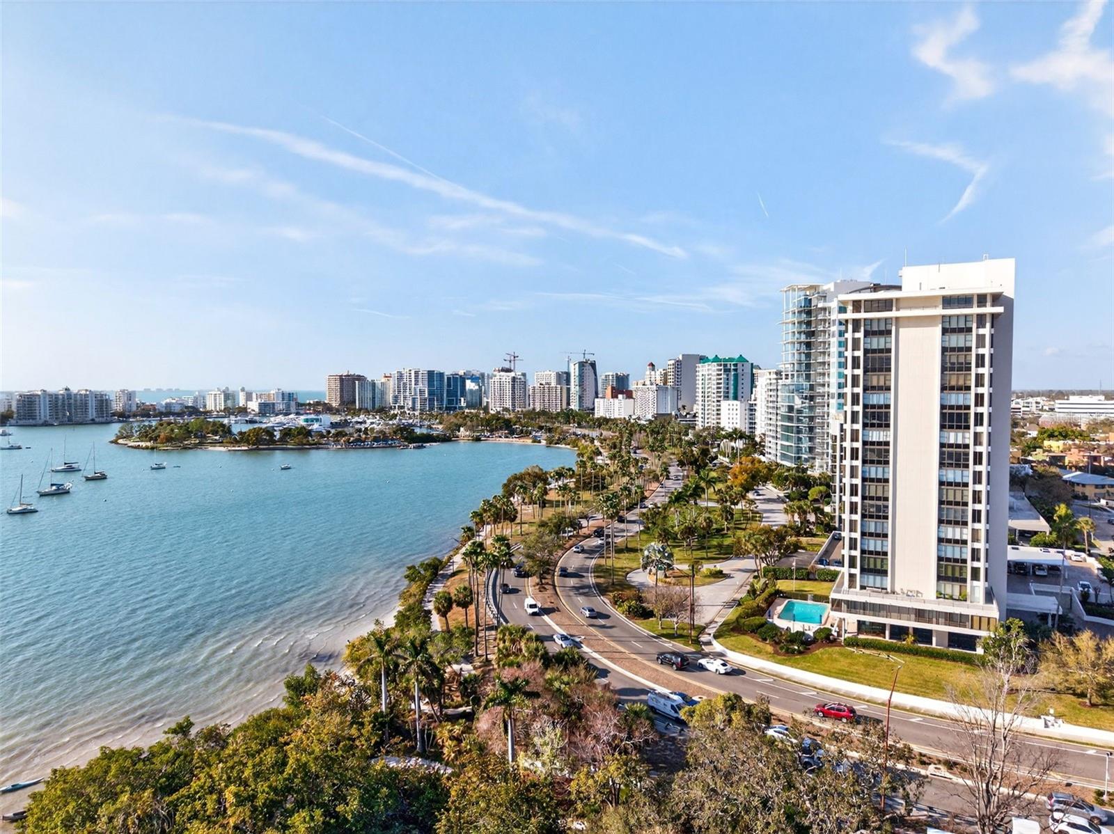 One or more photo(s) has been virtually staged. Welcome to Penthouse #2. This FULLY Furnished unit is offered with many recent upgrades, the rarely available top-floor penthouse at the iconic Embassy House delivers elevated downtown living with breathtaking waterfront views. Located on the 18th floor, one of four penthouses in the building, this two-bedroom, two-bath residence showcases sweeping, unobstructed views of Sarasota Bay, the John Ringling Bridge, and the Gulf of America and beyond.  

With no neighbors above, you’ll enjoy exceptional privacy and a daily front-row seat to Sarasota’s world-famous sunsets and vibrant coastal skies. Natural light pours into the open living and dining areas, creating a bright, welcoming atmosphere. The enclosed sunroom is ideal for relaxing or entertaining while taking in panoramic bay views. Both bedrooms open to a private terrace, offering peaceful morning sunrises and sparkling downtown city views.

Embassy House is celebrated for its premier bayfront location and strong sense of community. Amenities include a heated saltwater pool, fitness center overlooking the bay, electric vehicle charging station, guest parking, outdoor grilling area, catering kitchen, and a recently updated modern lobby. Residents also benefit from concierge service, an on-site manager, and semi-private elevator access serving just two residences per floor.

A shared laundry room for PH1 and PH2 is maintained by the HOA, including service and replacement of washers, dryers, and A/C units. Rent includes cable, internet, water, sewer, and trash for a truly effortless lifestyle.

Just steps from Selby Gardens, Bayfront Park, Marina Jack, and downtown Sarasota’s renowned dining, arts, and cultural attractions, this penthouse offers the perfect blend of vibrant city energy and serene waterfront beauty.

********************Also Available for lease at $5,900 a month******************Owner financing Available*******************