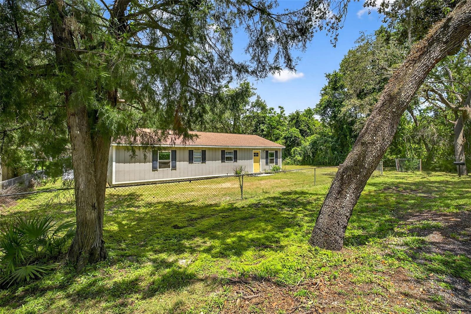 Looking for the perfect spot to build your future home? Come see this beautiful lot on Reynolds Street in Dade City! Located on a peaceful, tree lined street, this property offers quiet surroundings and plenty of space to make your vision a reality. No HOA or CDD. You'll have the freedom to design and build what works best for you. Whether your're looking to create your dream home, a weekend getaway, or an investment for the future, this land is full of potential. Just minutes from downtown Dade City, you'll be close to shops, restaurants, parks and everything this growing area has to offer-while still enjoying the calm and quiet of a tucked-away location. Don't miss this chance to own a piece of land in one of Pasco County's most loved communities. Come walk the property and picture what you can create! The current structure has sustained flood damage.