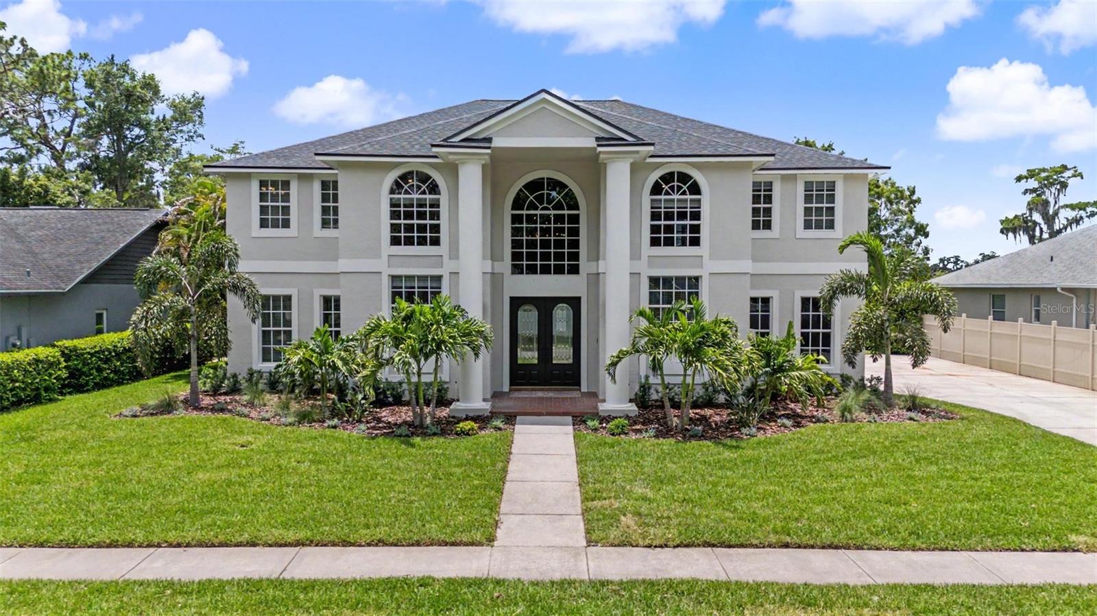 Under contract-accepting backup offers. Welcome to your lakefront paradise in the gated community of Keystone Manors. This meticulously maintained 4-bedroom, 4.5-bathroom home with a 3-car garage, separate office, and nearly 100 feet of frontage on beautiful Lake Maurine offers stunning water views and breathtaking sunsets from almost every room.

Recent upgrades include a brand new roof, fresh interior and exterior paint, updated landscaping and landscape lighting, new A/C systems (2019 and 2024), epoxy garage floors, and an upgraded electrical system with multiple 240V outlets and electric vehicle charging capability.

The spacious kitchen is the heart of the home, featuring beautiful finishes and expansive views overlooking the lake, pool, and outdoor living areas. The dramatic two-story entry, cozy fireplace, private office, and open floor plan create the perfect balance of elegance and functionality.

Outside, enjoy the large pool and spa, custom Brazilian teak lanai ceilings with integrated speakers, outdoor shower, and multiple spaces designed for entertaining and relaxing.

One of the property's most unique features is that it is one of only a handful of homes on Lake Maurine that allows direct boat launch access from the property itself. Spend your days boating, fishing, skiing, jet skiing, or simply enjoying the peaceful waterfront setting.

This move-in ready lakefront retreat offers the perfect combination of luxury, recreation, and recent upgrades in one of the area's most desirable gated communities.