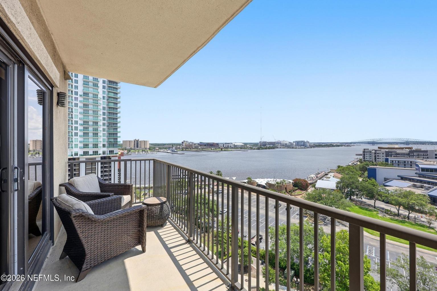 Experience luxury high-rise living in the heart of Downtown Jacksonville at San Marco Place Condos. This 2-bedroom, 2-bathroom unit on the 11th floor offers stunning views of the St. Johns River and the Jaguars' Stadium from your private rear balcony. The open-concept layout features modern finishes, ample natural light, and seamless flow between the kitchen, living, and dining areas. Located directly across from the Southbank Riverwalk, this condo offers walkable access to dining, shopping, and entertainment. Residents enjoy access to amenities located on the 4th floor, including a fitness center, swimming pool, spa, and clubroom. The building is secured with a keypad entry system and has a full-time security guard at the front entrance. Assigned parking is available in the private garage. This is downtown living at its best with comfort, security, and incredible views. Unit is also being listed for rent