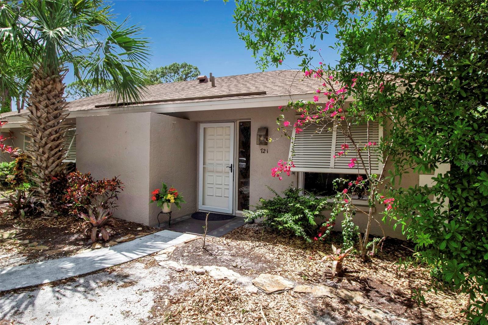 721 N Jefferson is only MINUTES away from Downtown Sarasota! An exceptional investment opportunity with strong rental flexibility. No ownership waiting period before leasing, a one-month minimum, and up to four rentals per year—an incredibly rare benefit for an association, particularly this close to downtown Sarasota.This beautifully updated villa in Jefferson Pines has one of the best locations in the community with a private lanai view. Featuring 2 bedrooms and 2 bathrooms, NEW IMPACT WINDOWS, NEW AC, NEW WASHER AND DRYER, UPDATED WATER LINES, Interior paint refreshed, vinyl flooring in the bedrooms, and recently updated kitchen with NEW REFRIGERATOR. The home has an open-concept living space and with the bedrooms to one side of the unit. The community has a fresh new paint on the exterior of the units, a community pool to enjoy and a quiet neighborhood. Enjoy the outdoor living in a private backyard, just minutes from downtown Sarasota's newest restaurants, walkable Bayfront, shopping, and the stunning Gulf Coast Beaches. Being close to Fruitville Road you are almost a straight shot to Lido Beach. Within 5 minutes you can get to downtown, Publix, and Payne park- you truly have everything at your fingertips.  A true gem ready for you to move in! 
Whether you’re searching for a full-time residence or the perfect snowbird getaway, and location tops your list, this move-in-ready villa offers everything you need—along with easy access to downtown Sarasota.