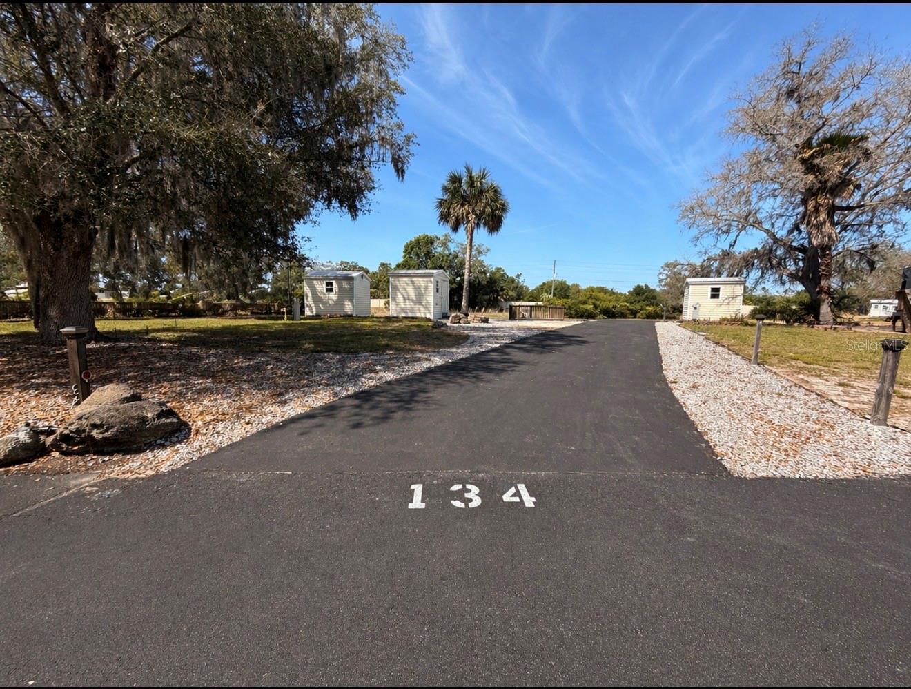 Lot 134 in one of the most sought after RV resorts in Crystal River is an opportunity you do not want to miss. This beautiful gated community is known for its safety, peaceful atmosphere, and vibrant social lifestyle, all just minutes from the area’s famous natural springs.

This spacious back in lot offers added privacy and a tucked away feel, perfect for those looking to relax and unwind in a quieter setting within the community.

Whether you are looking for a relaxing getaway, a full time residence, or the perfect vacation spot, this lot offers it all. Enjoy a welcoming community with incredible amenities and a full social calendar designed to help you unwind and connect.

This lot includes your own private shed with electricity already in place. There is also the option to add water and create your own washer and dryer setup just steps from your RV. A rare bonus is the additional storage space within the community, perfect for safely storing your boat.

For those looking for convenience, there is also an RV available for purchase, giving you the option to create a fully turnkey setup. Even more, this lot offers strong income potential with the ability to have seasonal tenants already in place if desired.

This is more than just a lot, it is a lifestyle.