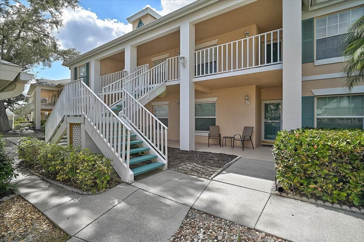 Join the maintenance-free community of Fairway Trace at Peridia designed for easy living and connection. This 2BR/2BA first-floor condo offers a beautiful, centered lake view, ideal for peaceful mornings and relaxing evenings. The kitchen features granite countertops, adding both style and functionality. Hurricane-impact windows provide added peace of mind and year-round comfort. The A/C system equipped with a surge protector was replaced in 2020 with the addition of a UV-V light in 2024 for enhanced air quality. Whether you’re searching for a full-time residence or a part-time retreat, this home supports convenient, low-maintenance living. The thoughtfully designed layout allows for easy access and everyday functionality, while the serene water view creates a calm, welcoming atmosphere. Enjoy a community where neighbors naturally connect. Each building includes a detached garage with one assigned parking space per unit. Fairway Trace is situated within Peridia Golf & Country Club, a community known for its extensive recreational and social offerings. Amenities available to residents include an 18-hole executive golf course, tennis and pickleball courts, an active clubhouse, live entertainment, water aerobics, Mahjong, and a variety of organized clubs. Peridia members enjoy exclusive events held throughout the year, supporting an engaging and active lifestyle with ample social opportunities. Applicable fees include a one-time Capital Reserve contribution of $4,000, an Annual Food/beverage Minimum of $600, a Quarterly Master Association fee of $938, and a Quarterly Management fee of $1,465. Schedule your showing today!
