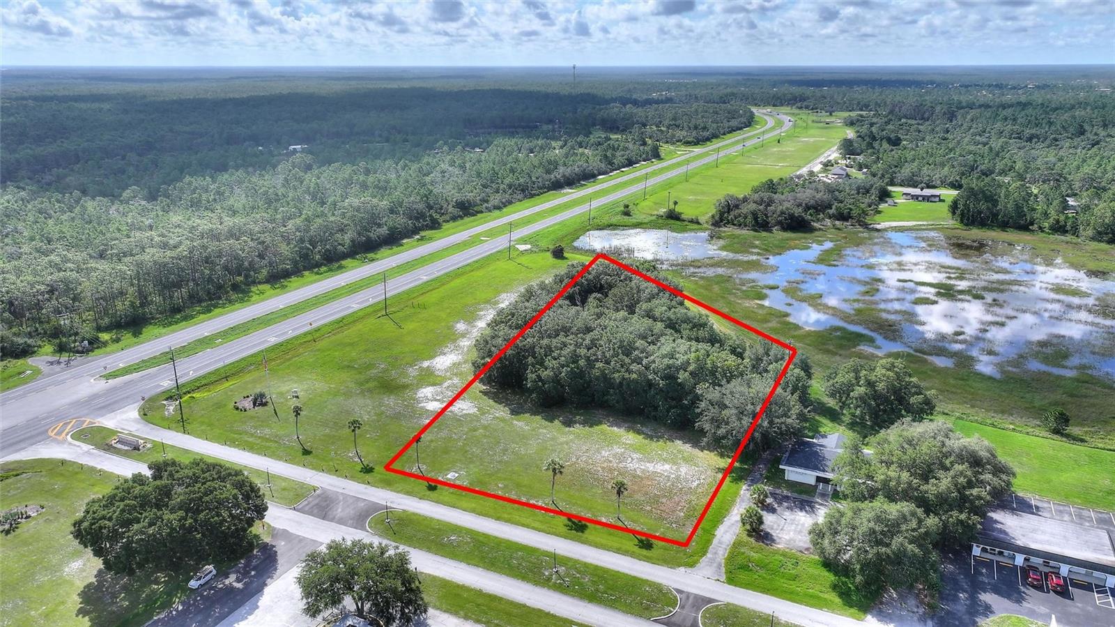 Prime commercial lots with outstanding Highway 60 visibility in the heart of Indian Lake Estates! Ideally situated directly across from the community plaza and adjacent to an office building, real estate office, and restaurant, these lots offer an exceptional opportunity for your next business venture.

Perfect for a neighborhood grocery store, convenience store, hardware store, bait and tackle shop, specialty retail, professional offices, or other community-focused businesses. With excellent exposure to both local residents and passing traffic, this is a rare opportunity to establish your business in a growing area.

Indian Lake Estates offers a unique lifestyle with access to beautiful Lake Walk-in-Water, one of Florida's premier fishing lakes, along with golf, boating, dining, and other recreational amenities. Just around the corner is the beautiful Canopy Oaks RV Resort, bringing additional visitors and seasonal residents to the area. Plus, the renowned Westgate River Ranch Resort & Rodeo is only about 10 minutes away, providing even more tourism and traffic to support local businesses.

Don't miss your chance to invest in one of the most visible commercial locations in Indian Lake Estates!