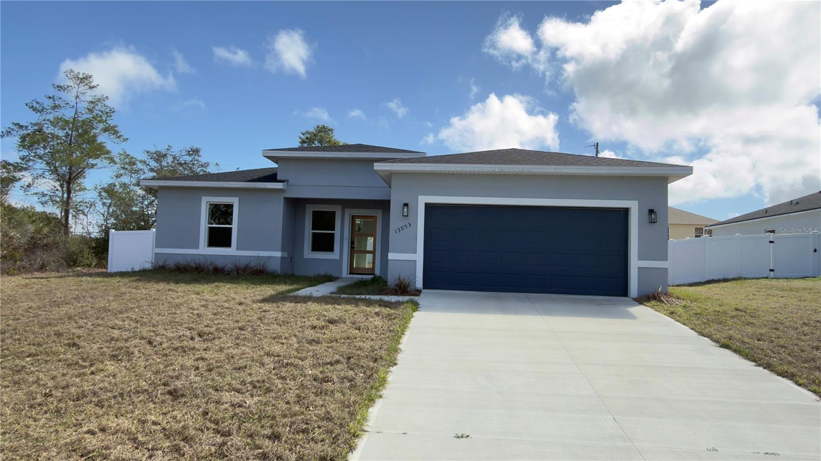 Move-In Ready – Your Florida Dream Home Is Waiting This is not a property under construction. This home is  completed and ready for immediate move-in, and the seller is offering closing cost assistance, making this an exceptional opportunity for buyers looking for value and convenience. Adding even more appeal, the property just received a brand-new fence, enhancing privacy, security, and the overall outdoor living experience. Offering 1,833 sq. ft. of living space, this beautiful home features 4 spacious bedrooms and 2 modern bathrooms, thoughtfully designed to combine comfort, elegance, and everyday practicality. As you step inside, you are welcomed by a bright and open layout that seamlessly connects the living room, kitchen, and dining area, creating a natural flow filled with abundant light. The open-concept design makes the home ideal for both relaxing with family and entertaining guests. The kitchen is one of the standout highlights, featuring stainless steel appliances, ample cabinet space, and a convenient breakfast bar, perfect for casual meals, morning coffee, or gathering with friends. The dining area, located right next to the kitchen, offers a comfortable space for both formal dinners and everyday family moments, enhancing the home’s functionality and welcoming atmosphere. Step outside and enjoy the benefits of a generous 0.23-acre lot, offering plenty of space, privacy, and endless possibilities. The newly installed fence makes the backyard perfect , pets, entertaining guests, or future upgrades such as adding a pool, outdoor kitchen, or beautifully landscaped retreat. For added peace of mind, the property also includes a 2-10 Home Buyers Warranty, providing valuable protection and confidence for the new owner. Located in a highly desirable and fast-growing area of Florida, this home represents a rare opportunity to own a modern, spacious, move-in-ready property with strong appreciation potential.