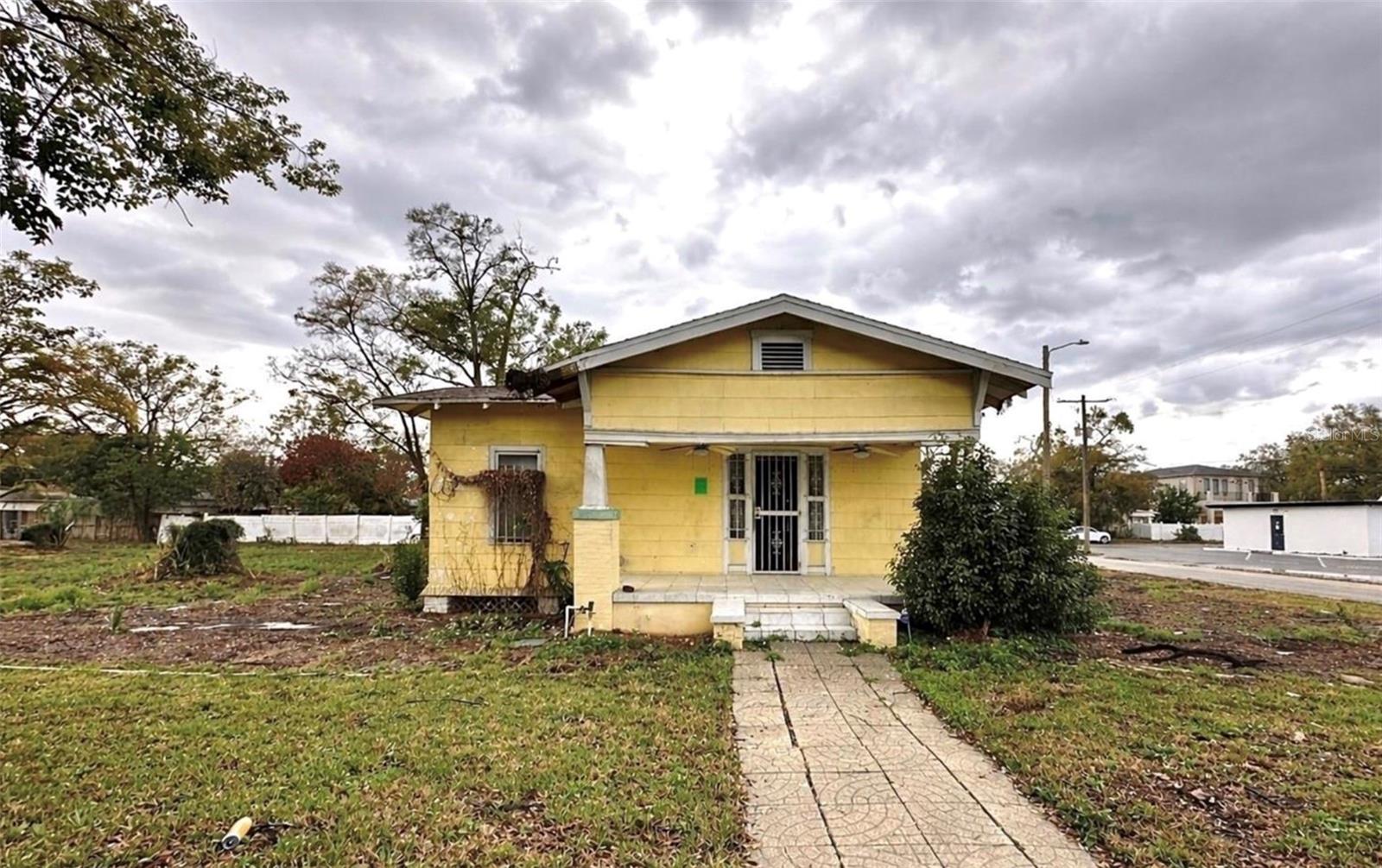 Property features an existing structure on it and is sold as land value. BEST PRICED DEVELOPMENT OPPORTUNITY IN TAMPA HEIGHTS! Approved, Entitled Site that's ready for Townhome Development in Tampa Heights! Rare opportunity to acquire either 2 or 3 contiguous parcels in the rapidly evolving Tampa Heights neighborhood. The properties located at 3208 N Tampa St (Folio 182200) and 3210 N Tampa St (Folio 182199) are being offered together, creating a prime development opportunity in one of Tampa’s most active growth corridors. The property conveys with approved Planned Development site plan in place for 6 townhome units, providing a streamlined path toward vertical construction for a builder or developer. Located in close proximity to Downtown Tampa, Armature Works, and the Tampa Riverwalk, the property benefits from strong residential demand and continued investment throughout the surrounding area. The neighborhood continues to experience steady growth with new multifamily and single family development contributing to long term value. Additionally, the property is located within a Qualified Opportunity Zone, offering potential tax advantages for eligible buyers seeking long term investment strategies. This offering presents a compelling opportunity for builders, developers, or investors seeking entitled land within a high demand area. One or more photos was virtually staged. Renderings are for illustrative purposes only. Buyer/Buyer’s Agent to verify all zoning and development requirements. Property located at 3206 N Tampa St is also available, approved for 3 additional townhome units.

Seller is willing to finance the purchase for a qualified Buyer.