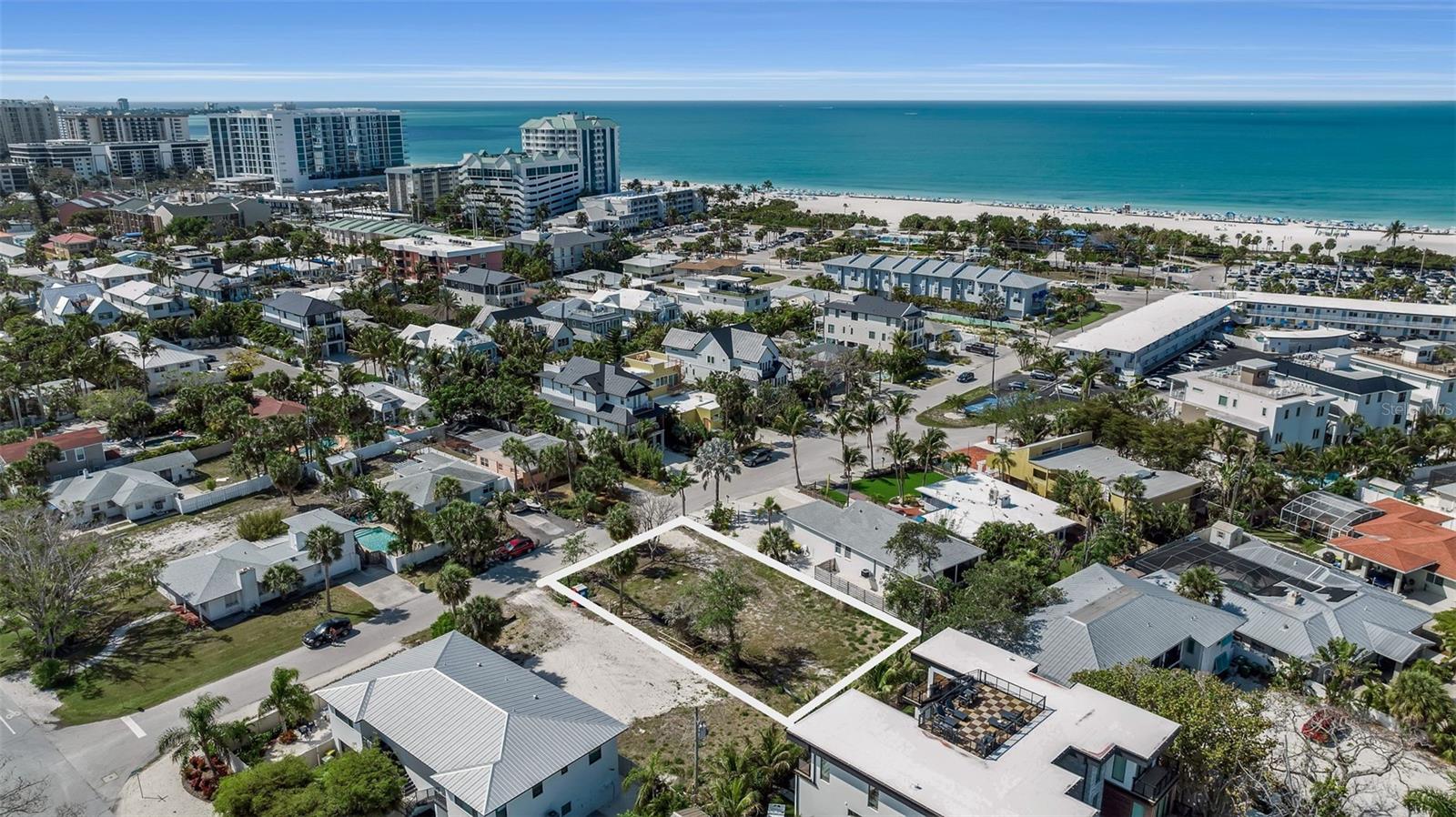 Create your modern coastal residence just moments from the sugar-sand shoreline on this rare, cleared homesite in the heart of Lido Beach. Measuring approximately 60-by-115, this property is ideally positioned for an effortless island lifestyle with access to the Gulf, the boutiques and dining of St. Armands Circle, and a short drive to vibrant downtown Sarasota. Zoning that allows seven-day rentals provides exceptional versatility for a future luxury home or investment-minded design. Architectural plans available. Build a three-story contemporary coastal residence featuring a rooftop deck, owners can capture both Gulf and Sarasota Bay sunset views, an elevated vantage point that defines the Lido Beach lifestyle. This is a premier opportunity in one of Sarasota’s most sought-after beach communities.