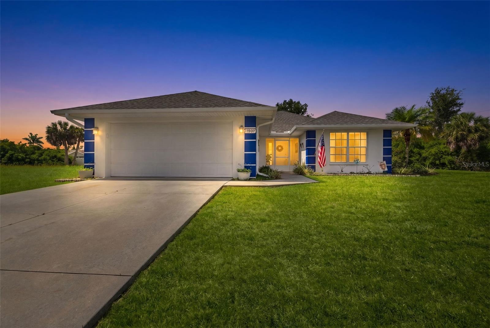 Welcome to your own private slice of Southwest Florida living! This well maintained 2 bedroom, 2 bathroom pool home offers an inviting open concept layout with a desirable split floor plan, providing both comfort and privacy. The spacious living area features a functional gas fireplace, creating a cozy focal point for relaxing or entertaining.

The kitchen is designed for everyday living and gatherings alike, complete with a center island, two pantry closets, ample cabinetry, and seamless flow into the main living spaces. Newer luxury vinyl flooring adds modern style and durability.

The primary suite offers a walk in closet and an en suite bath, while the guest bedroom and bath are thoughtfully positioned on the opposite side of the home. Both bedrooms are generously sized and can comfortably accommodate king size bedroom sets, offering flexibility and comfort for owners and guests alike.

Step outside to enjoy Florida living at its best. The screened pool cage overlooks an oversized .40 acre lot, providing plenty of room for pets, gardening, or outdoor activities. A fenced dog run area adds convenience for your four legged family members. Additional features include a paved driveway, attached 2 car garage, and a new septic tank installed in 2024.

With generous indoor and outdoor living spaces, modern updates, and a fantastic layout, this Port Charlotte pool home is ready for its next owner to enjoy.