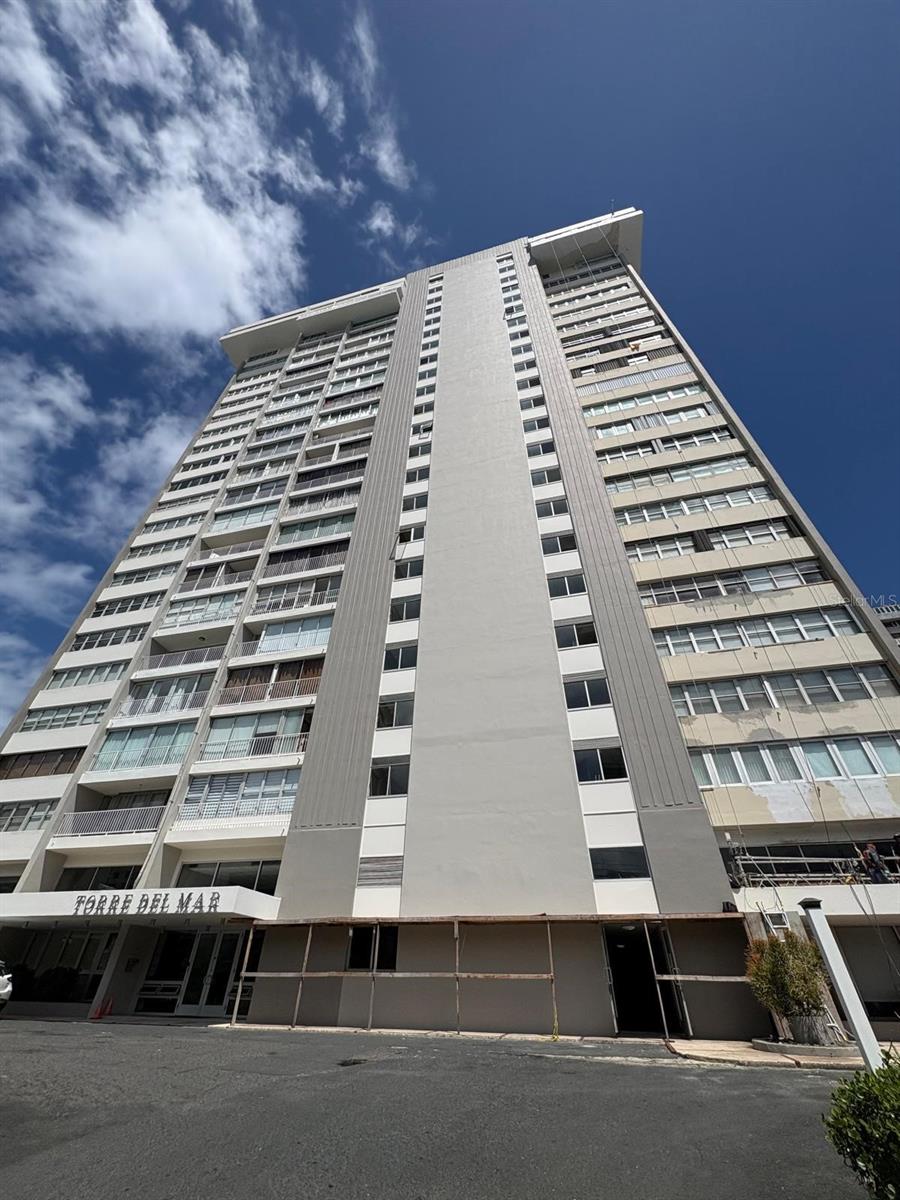 Experience elevated coastal living at Torre del Mar, one of Condado’s premier oceanfront condominiums. This high-floor residence features breathtaking ocean and city views, abundant natural light, and a private balcony to enjoy the sea breeze. Building amenities include 24-hour security, full backup generator, water cistern, swimming pool, fitness center, direct beach access, and assigned parking. Ideally located on Ashford Avenue, just steps from fine dining, cafés, boutiques, and parks.