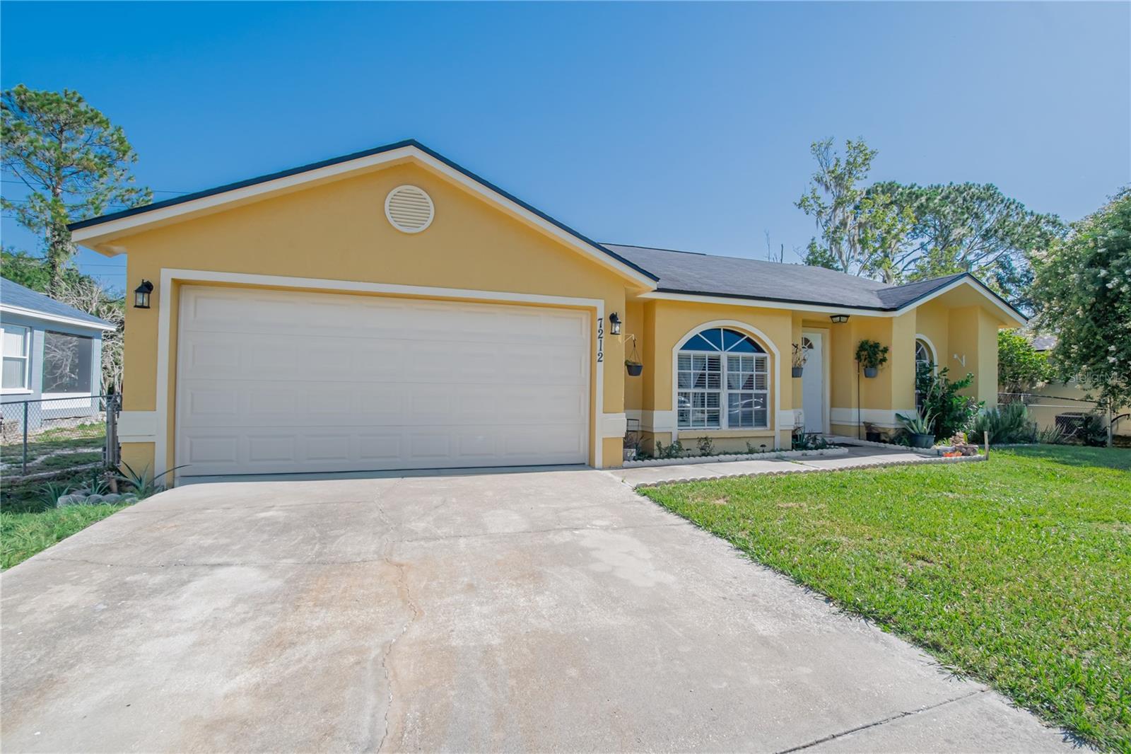 Move right in and enjoy this beautifully maintained 3-bedroom, 2-bath home that perfectly blends comfort, style, and functionality. Freshly painted inside and out, this inviting home features a desirable split-bedroom floor plan, offering privacy for families, guests, or roommates.

Step inside to discover wood-look ceramic tile throughout the main living areas, creating a seamless, low-maintenance living space. Natural light fills the open living area, making it the perfect place to relax or entertain. The well-equipped kitchen offers a full suite of appliances, generous counter space, and plenty of cabinetry to meet all your cooking and storage needs.

The spacious primary suite provides a peaceful retreat with an en-suite bathroom and ample closet space, while two additional bedrooms offer flexibility for guests, a home office, or hobbies.

One of the standout features of this home is the newly enclosed patio, creating an additional living space that's ideal for morning coffee, evening relaxation, or entertaining year-round while enjoying views of the backyard. Step outside to a fully fenced yard with plenty of room for pets, play, or outdoor gatherings.

Conveniently located and thoughtfully updated, this home is truly move-in ready. Don't miss your opportunity to make it yours—schedule your private showing today!