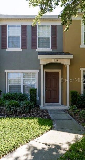 One or more photo(s) has been virtually staged. Welcome to the 2 bedroom, 2.5 bath townhouse in gated community of Regency Oaks in Sanford, FL., easily accessible to highways FL-417 (Central FL GreeneWay) and I-4, shopping centers and dining establishments. 
This home features an open floor plan on level 1, with new luxury laminate flooring in the living room. Kitchen is equipped with refrigerator, microwave, cooktop, dishwasher and new quartz counter tops, prep area is extended to serve as breakfast bar, along with half bath and a screen-enclosed patio with storage closet. 
Upstairs you'll find 2 bedrooms with private full bathrooms in each, master bedroom with dual closets and 2nd bathroom with a traditional wide closet. Laundry area is conveniently located next to the bedrooms with a linen closet for extra storage. 
Regency Oaks HOA offers residents a community pool, and the HOA fee also covers water and sewer. Set in the center of the community and surrounded by everything you may need, this townhome remains a calm beacon to guide you home each day. Schedule a tour and come see your new home!