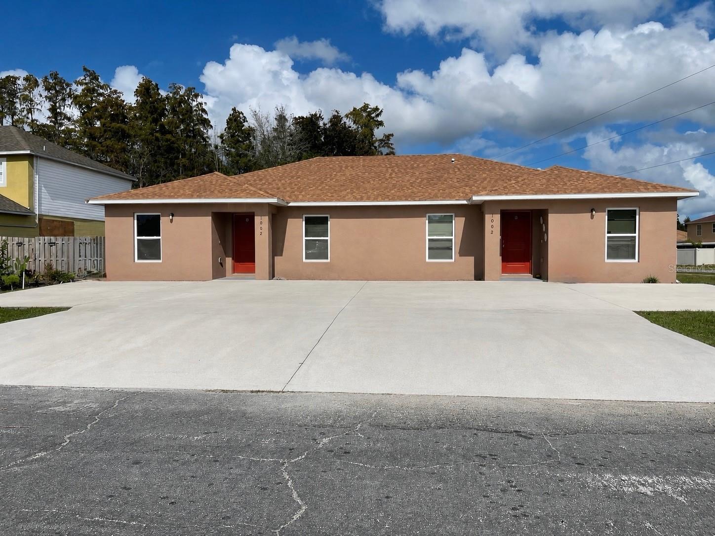 Excellent investment opportunity with immediate cash flow! Built in 2020, this well-maintained duplex offers flexibility for both investors and owner-occupants. One unit is leased at $1,800/month, providing immediate rental income, while the second unit is currently occupied on a month-to-month lease, giving the new owner the option to continue renting or owner occupy through a house-hacking strategy. At full occupancy, the property has the potential to generate $43,200 in gross annual rental income. Each unit features 3 bedrooms, 2 bathrooms, open-concept living spaces, modern finishes, tile flooring, and durable concrete block construction. The low HOA of $165/month includes internet and cable. Conveniently located near schools, shopping, parks, hospitals, and major roadways with easy access to Kissimmee, Lake Nona, Orlando, and area attractions. Whether you're expanding your investment portfolio or looking to offset your mortgage by living in one unit while renting the other, this property offers exceptional value. Please do not disturb the tenants. Lease information and additional financial details are available upon request.