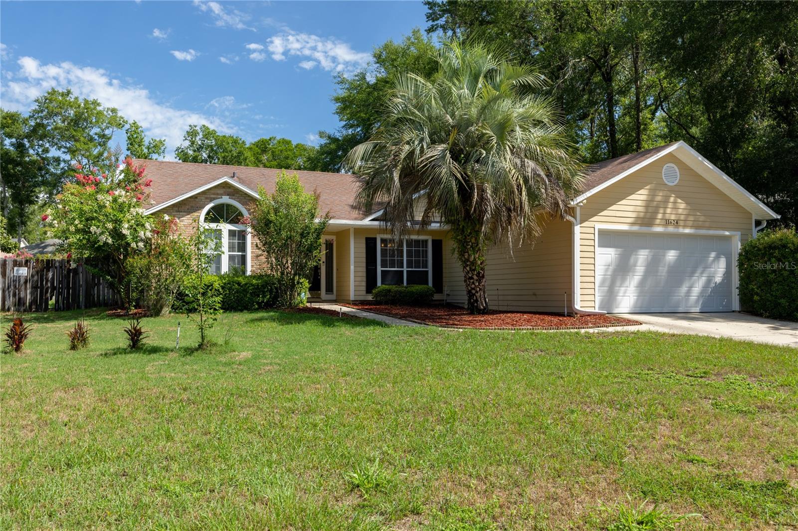 Short Sale. SHORT SALE - List price has not been approved by lender. Welcome home to this beautifully maintained 3-bedroom, 2-bath residence offering a spacious and versatile floor plan designed for comfortable Florida living. The inviting living room features a cozy wood-burning fireplace, creating the perfect gathering space for family and friends. A separate dining room provides ample space for entertaining, while the bright Florida room offers additional living space with views of the backyard oasis. The kitchen is well-appointed with stainless steel appliances, granite countertops, and a large wall pantry that provides abundant storage. The primary suite is conveniently located on the main floor, offering privacy and easy accessibility. Step outside and enjoy your own private retreat featuring a screened pool, screened porch, and covered back porch—ideal for year-round outdoor living and entertaining. With no carpet throughout the home, maintenance is a breeze while providing a clean, modern feel. Whether you're relaxing poolside, enjoying a quiet evening by the fireplace, or hosting guests in the multiple indoor and outdoor living spaces, this home offers the perfect blend of comfort, functionality, and Florida lifestyle living.