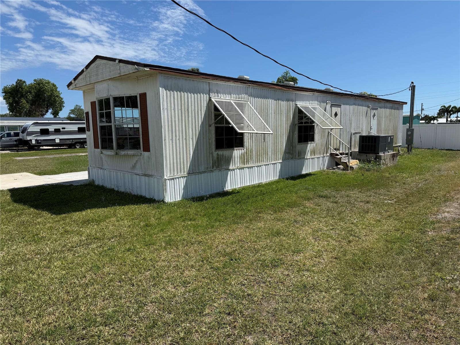 Investor opportunity in historic El Jobean. 4133 Nettle Road is a fixer-upper currently in the midst of remediation, offering a prime chance to renovate, rebuild, or customize to your needs subject to county codes and approvals. No HOA and no known lease restrictions provide flexibility for rental income, seasonal use, or long-term ownership. Public water and public sewer are already in place. Located near the marina, golf course, fishing, live entertainment, local art, shopping, dining, and the Myakka River/Charlotte Harbor area. El Jobean is one of Charlotte County’s hidden gems known for its Old Florida charm and waterfront lifestyle. Great potential for investors, builders, or buyers seeking value and vision. Please The shed does not covey with sale.