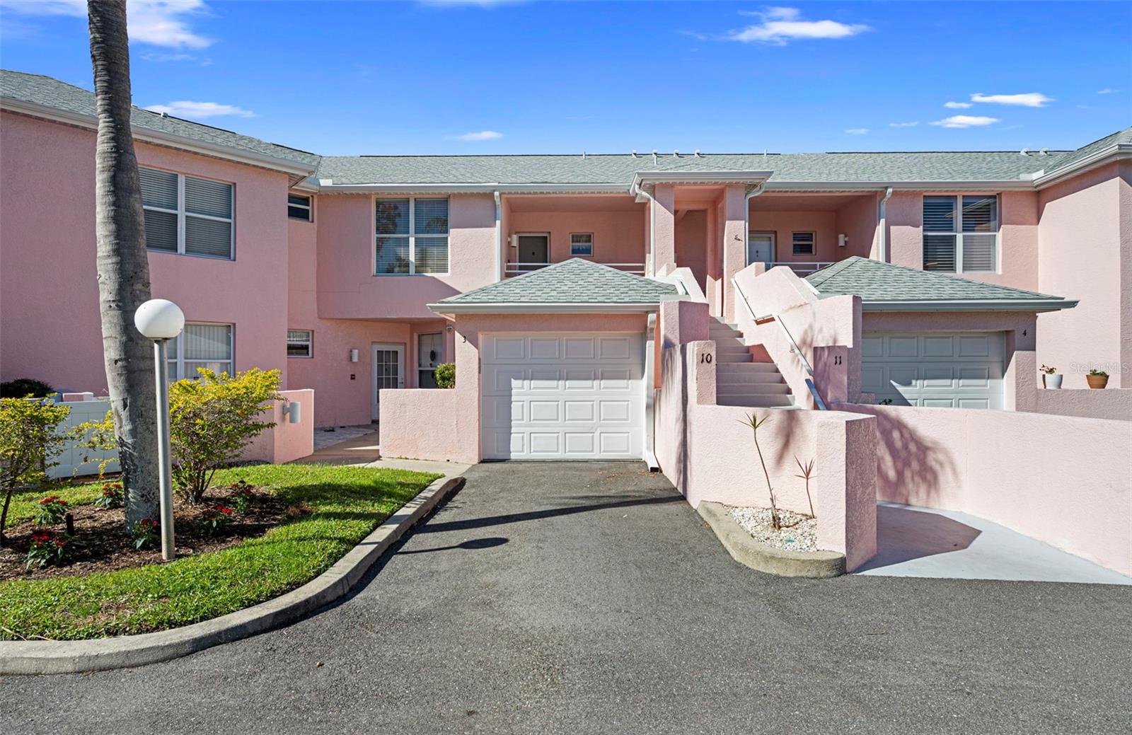 BRAND NEW AIR CONDITIONING 4/24/26  YOU DON'T HAVE TO PLAY GOLF IF YOU LIVE HERE, BUT IT'S A LOT MORE FUN IF YOU DO...THIS SELLER IS MOTIVATED, WILL CONSIDER ALL OFFERS, BEAUTIFUL CONDO WITH AN UPDATED KITCHEN, SECOND FLOOR RESIDENCE HAS WATERVIEWS AND GOLD COURSE VIEWS. THIS UNIT OFFERS HIGH CEILING. As you walk in, the living room area welcomes you, it's nice and bright The kitchen features granite COUNTERS,  new cabinets and is open to the dining room and there is  an eat-in space right by the kitchen window overlooking the front of the condominium. Completing the living area you have the den,  and the porch which is enclosed with sliders. THE NEXT BEST THING TO A GOLF COURSE IS  (of course) A SANDY BEACH, and nearby is World renowned Anna Maria Island and those fabulous beaches are only minutes away. You can ride, bus or bike your way there. There is a shady carport for your auto. The condo is fully furnished, TKF and tastefully decorated. There is a laundry room just off the kitchen and easy to clean wood floors .