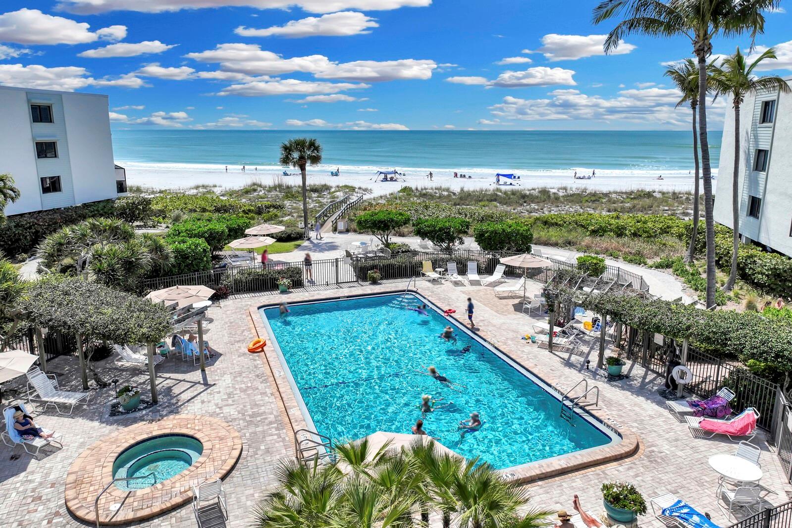 Welcome to your dream Boca Grande getaway! Located within a gated community, this 2nd-floor condominium offers a blend of resort-like living and convenience, with an array of amenities, tasteful décor, and elevator access to your front door. As you step inside, you're immediately greeted by serene views of the Gulf of Mexico, which can be enjoyed from just about every room. The updated interior features a delightful kitchen with ample cabinetry and a terrific layout, making meal preparation a breeze. Behind the kitchen is a cozy nook that is perfect for a bunk room or an in-home office. Both bedrooms provide comfortable retreats with ample storage space, but it's the view from the primary bedroom that steals the show. The spacious screened-in porch is the perfect place to enjoy your morning coffee as you gaze out to the endless horizon of the Gulf of Mexico. At the end of the day, it is the perfect retreat to raise a toast while soaking in the picturesque sunsets. This lovingly-maintained condo offers more than just stunning views – it's also equipped with hurricane-rated impact windows and doors and its own maintenance services, ensuring peace of mind for homeowners. Additional amenities include beachfront living, a heated pool, tennis courts, outdoor grilling areas, a golf cart charging station, dedicated covered parking for owners, and plenty of visitor parking. This prime location, on the north end of the island, provides larger and uncrowded beaches that are ideal for shelling and leisurely strolls. Whether you're seeking a permanent residence or a seasonal escape, don't miss your chance to experience the ultimate in maintenance-free coastal living. Photos were taken prior to Hurricane Milton.