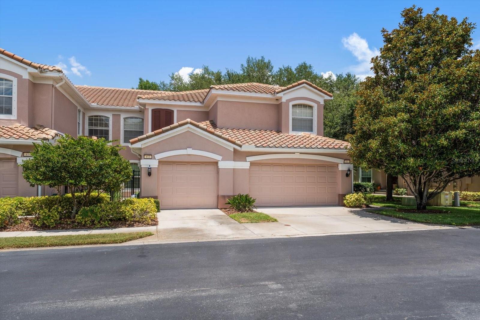 Virtually Staged. Virtually Staged - Welcome to the highly sought-after gated community of Coachman Reserve, where comfort, convenience, and Florida living come together beautifully. This move-in-ready villa features a thoughtfully designed floor plan with hardwood flooring throughout the main living areas and plush carpeting in the bedrooms and den.

The spacious living room and formal dining area provide ideal spaces for relaxing or entertaining. The kitchen offers ample cabinetry, generous workspace, and a cozy breakfast nook for casual dining.

Enjoy seamless indoor-outdoor living with a screened lanai accessible from the living room, breakfast nook, and primary suite—perfect for morning coffee or evening relaxation. The primary suite serves as a private retreat with an ensuite bath and direct lanai access. Located toward the front of the home, the guest bedroom, guest bath, and versatile den offers flexibility for visitors, a home office, or hobbies. A convenient laundry room off the garage adds everyday practicality.

Residents enjoy an exceptional location just minutes from Clearwater Beach, as well as the charming downtown districts of Dunedin and Safety Harbor, known for their waterfront parks, dining, shopping, and community events.

With easy access to golf courses, parks, major roadways, and everyday conveniences, this home offers the perfect blend of tranquility and accessibility. Experience the lifestyle that makes Coachman Reserve one of Clearwater's most desirable communities.