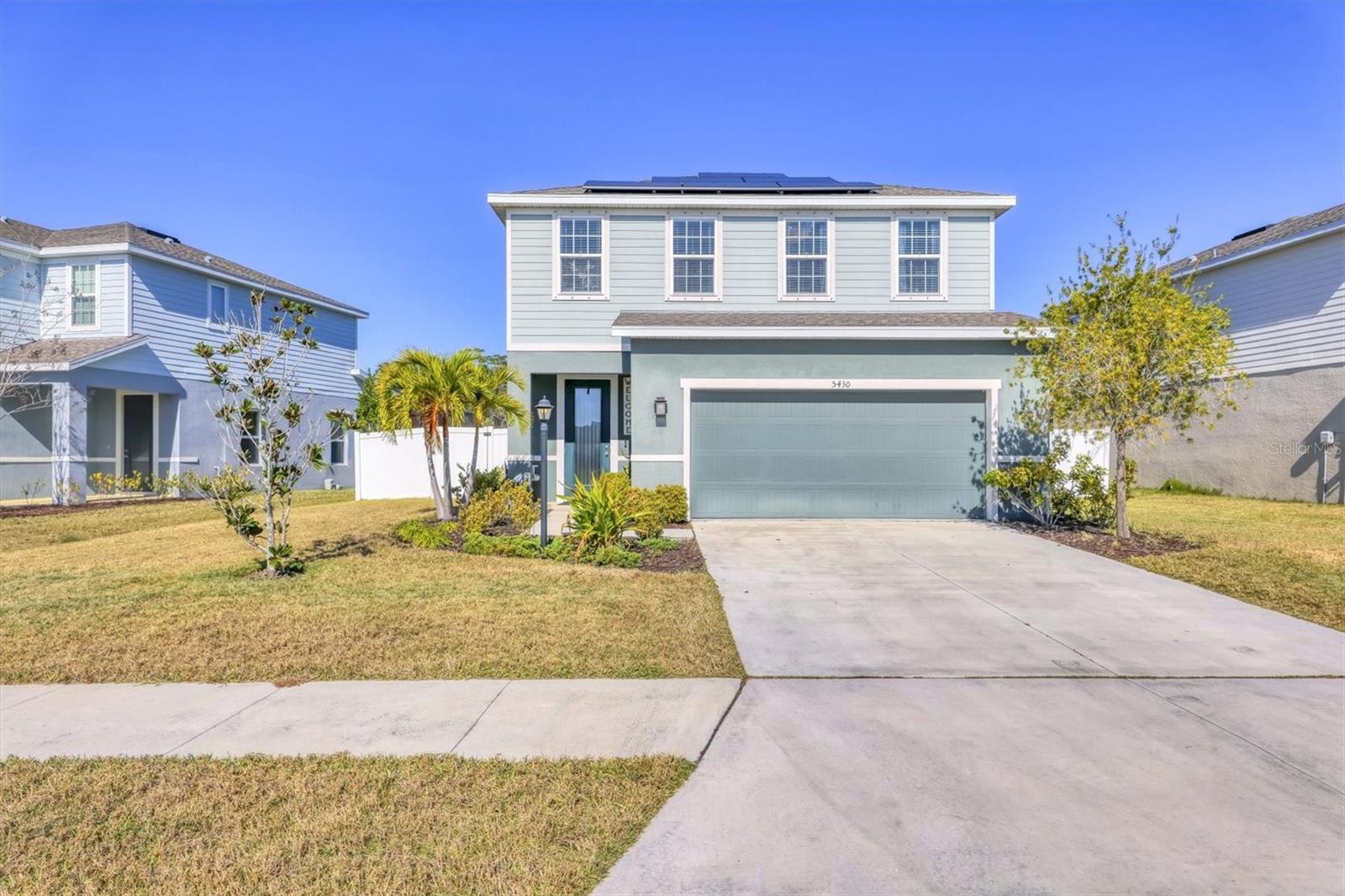 Welcome home to Moss Creek, a charming, gated community designed with families in mind—offering low HOA fees, no CDD, and a welcoming neighborhood feel just minutes from everything Bradenton has to offer. This near brand-new home gives you the peace of mind of modern construction without the added cost of builder upgrades, featuring granite and quartz countertops, 42” cabinetry, and stainless-steel appliances already in place.

Conveniently located just off SR-70, Moss Creek provides easy access to top-rated schools, parks, grocery stores, and family-friendly dining, with University Town Center and Ellenton Premium Outlets close by for shopping and entertainment. Community amenities include a resort-style pool, shaded cabana, and open green spaces—perfect for weekend playtime, relaxing afternoons, or gathering with neighbors.

The Windermere floor plan offers a thoughtful layout ideal for family living. This two-story home features 4 bedrooms, a dedicated study, 2.5 bathrooms, a spacious loft, and a 2-car garage—providing room for everyone to spread out and grow. The open-concept kitchen and main living area make everyday living and family gatherings easy and connected, while all bedrooms are privately located upstairs, creating a quiet retreat at the end of the day. The large loft is perfect for a playroom, homework zone, or second family room.

Flexible spaces allow you to tailor the home to your needs, with options for a covered lanai or even an additional bedroom. Smart-home features such as a WiFi-enabled garage door opener, over and Nest thermostat add convenience, while solar panels power the entire home, helping keep energy costs in check.

Best of all, beautiful Gulf Coast beaches like Anna Maria Island and Siesta Key are only about 30 minutes away, making family beach days an easy reality.

Don’t miss this opportunity to own a move-in-ready home in one of Bradenton’s most desirable, family-friendly gated communities.