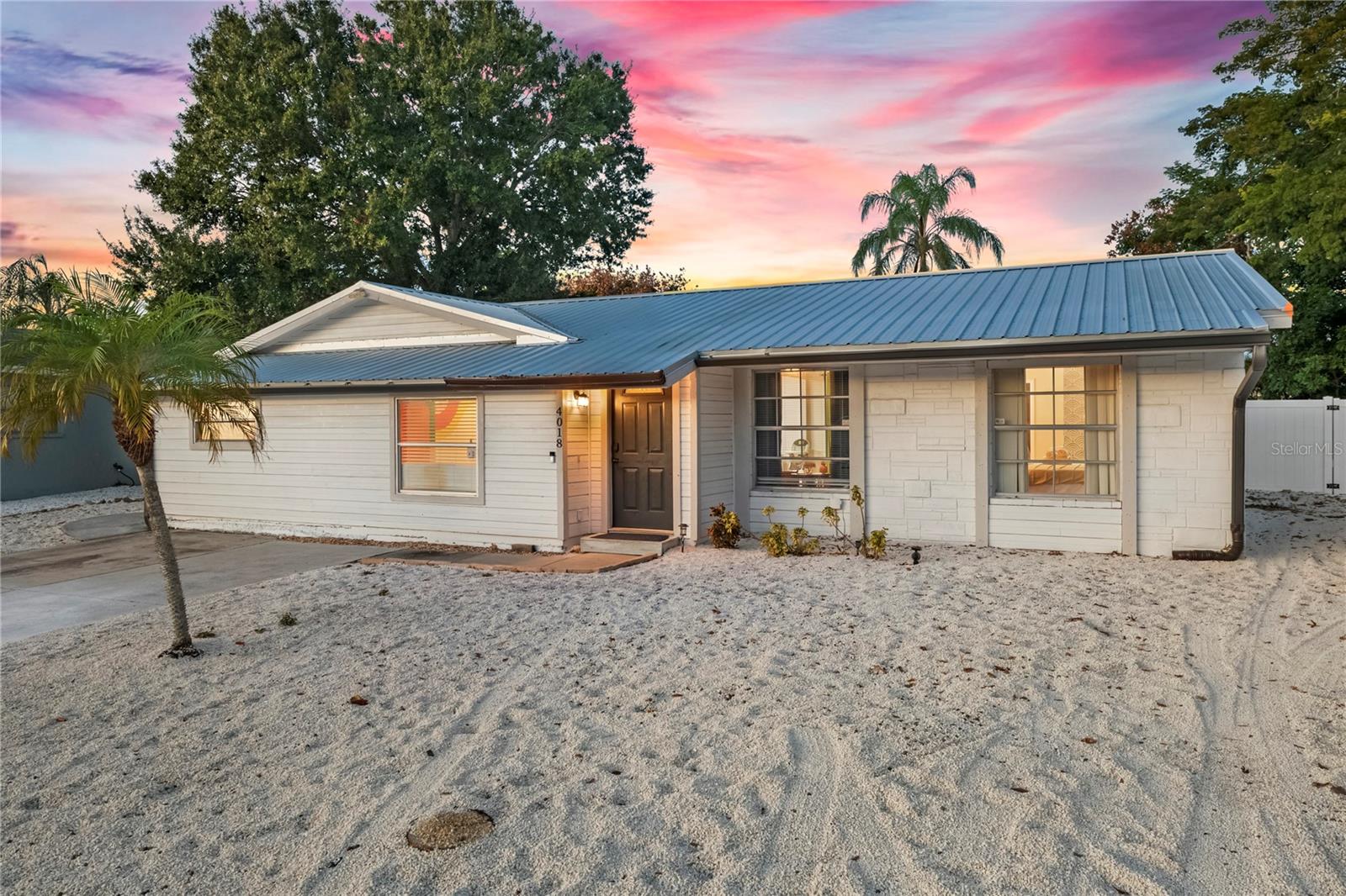 Discover the perfect blend of retro charm and modern upgrades with this fully turnkey furnished 3-bedroom, 2-bath pool home in the heart of Bradenton. Currently operating as a successful active Airbnb with over $60,000 currently on the books for 2026, this property is an incredible opportunity for investors, second-home buyers, or those seeking their own private Florida retreat.


Designed with a fun, retro-inspired aesthetic, the home has amenities guests and owners alike will love — including a sparkling private pool, fire pit lounge area, putting green, ping pong table, and an arcade game for endless entertainment. Inside, the updated kitchen features modern finishes and functionality, creating the perfect space for hosting and gathering.


Major improvements provide peace of mind, including a new metal roof (2023), AC (2022), and an updated 200-amp electrical panel (2026). Whether you are looking for a high-performing vacation rental or a stylish coastal getaway, this property delivers both income potential and unforgettable experiences.