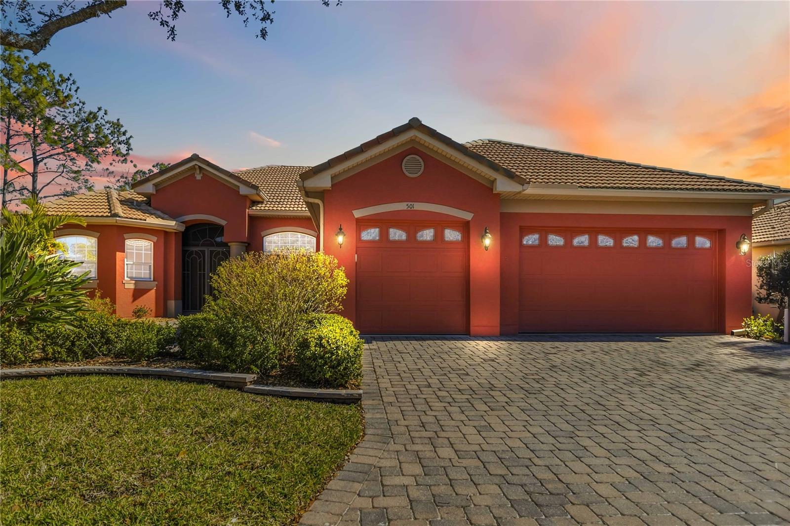One or more photo(s) has been virtually staged. PRICE REDUCED!!! This beautifully refreshed Solivita Verona-style home is the kind of place that instantly feels like the one. Best Location in the Community- golf course views and right by the main entrance! No traffic! Thoughtfully updated and lovingly remodeled, it’s ready to welcome its next chapter. Set on an oversized lot, the home is surrounded by serene golf course and water views—visible from nearly every window—and tucked into one of the rare Solivita locations offering two stunning 18-hole courses.

Inside, you’ll find everything buyers dream of; an open-concept kitchen and living space with soaring ceilings, crown molding throughout, custom lighting, wood plantation shutters, and carefully chosen window treatments. A dedicated home office offers a quiet place to focus, while ingenious storage solutions keep everything beautifully in its place. The three-car garage includes space for a golf cart, making everyday living effortless.

The owner’s retreat is a peaceful escape, complete with a spa-like bath featuring a walk-in Jacuzzi tub and shower. Step outside to the expansive covered lanai—perfect for year-round entertaining or simply enjoying a quiet morning coffee with a view.

This home shines with meticulous upgrades, including new carpet in all bedrooms, a new water heater, 42” solid oak cabinetry with nickel hardware, granite countertops, a deep double sink, and stainless-steel GE appliances, metal tinted windows to keep your home cool, extended pavers in the front of the home and tons of storage space!

Be sure to explore the Matterport virtual tour and YouTube video to experience even more of what makes this home so special.

Located in Solivita, a premier 24-hour guard-gated 55+ community, residents enjoy resort-style living with two state-of-the-art amenity centers, fitness facilities, 14 pools and spas, tennis, pickleball, billiards, shuffleboard, bocce ball, on-site restaurants, dog parks, over 200 clubs, and two championship 18-hole golf courses.