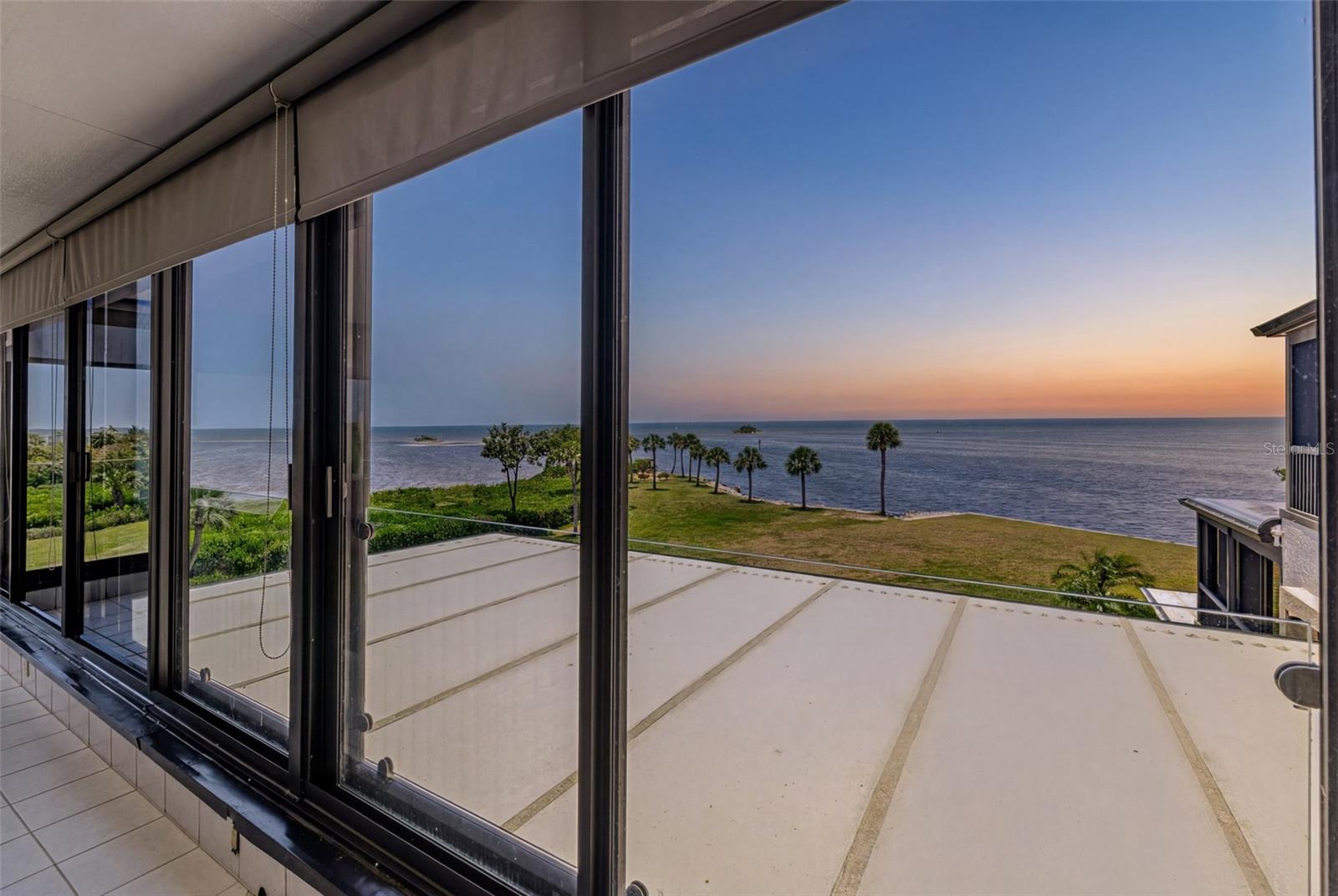Experience luxury waterfront living in the impressive Marina Southshore community within Burnt Store Marina! This spacious 2,690-square-foot condominium offers 3 bedrooms, 2 baths, and breathtaking panoramic views of Charlotte Harbor from one of Southwest Florida's most desirable waterfront locations.

Designed to maximize both comfort and scenery, this exceptional residence features an expansive 500-square-foot air-conditioned lanai that serves as additional living space year-round. Enjoy your morning coffee while watching boats cruise through Charlotte Harbor and end each day with unforgettable sunsets that fill the sky with vibrant colors.

The thoughtfully designed floor plan offers generous living and dining areas, abundant natural light, spacious bedrooms, and seamless indoor-outdoor living. Large windows throughout the home capture stunning water views and create a bright, coastal atmosphere that perfectly complements the Florida lifestyle.

Located in the sought-after Marina Southshore community, residents enjoy a private gated enclave featuring beautifully maintained grounds, a resort-style waterfront community pool, clubhouse, and elevators for convenience. Marina Southshore is known for its exceptional harbor views, peaceful setting, and prime location within Burnt Store Marina. The community provides a welcoming atmosphere where neighbors gather for social events while enjoying some of the most spectacular waterfront scenery in Southwest Florida.

Beyond Marina Southshore, Burnt Store Marina offers an unparalleled lifestyle. As Southwest Florida's largest deep-water marina, residents enjoy direct boating access to Charlotte Harbor, Boca Grande Pass, and the Gulf of Mexico. Community amenities include two waterfront restaurants, the Trading Post convenience store, Harbor Master's office, 27-hole executive golf course, tennis and pickleball courts, fitness center, yacht club activities, walking and biking paths, and an active social calendar filled with clubs and events.

Whether you're an avid boater, golfer, fisherman, or simply seeking a relaxed waterfront lifestyle, this exceptional residence offers the perfect combination of luxury, convenience, and recreation. From dolphin sightings and waterfront dining to world-class boating and endless sunsets, Marina Southshore at Burnt Store Marina delivers the ultimate Florida waterfront experience.

Don't miss this rare opportunity to own a stunning waterfront condominium with expansive Charlotte Harbor views, a 500-square-foot air-conditioned lanai, and access to the outstanding amenities of both Marina Southshore and Burnt Store Marina.