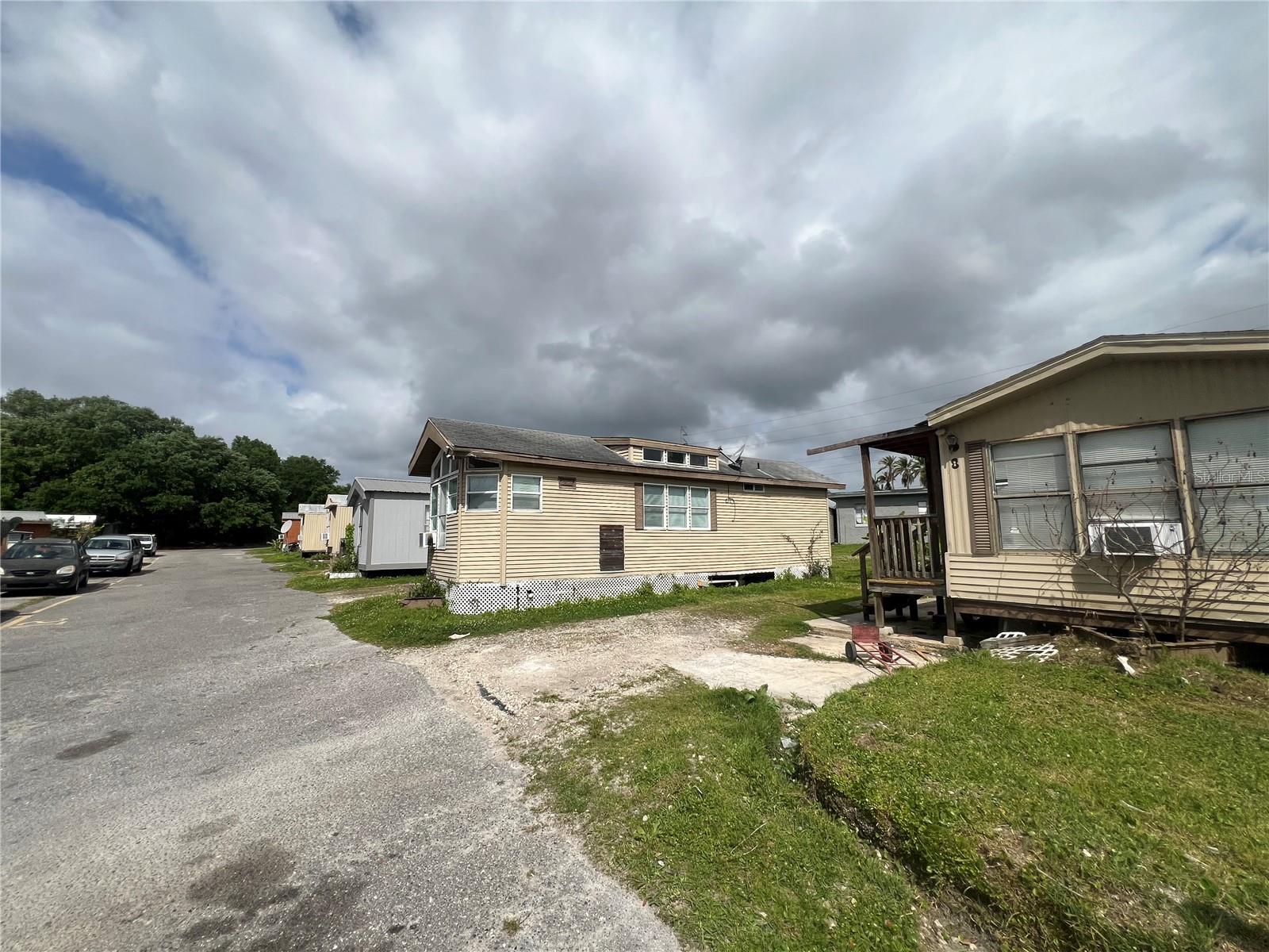 LAKE JOHNS MOTEL APTS. & TR. PK - Residential Income
