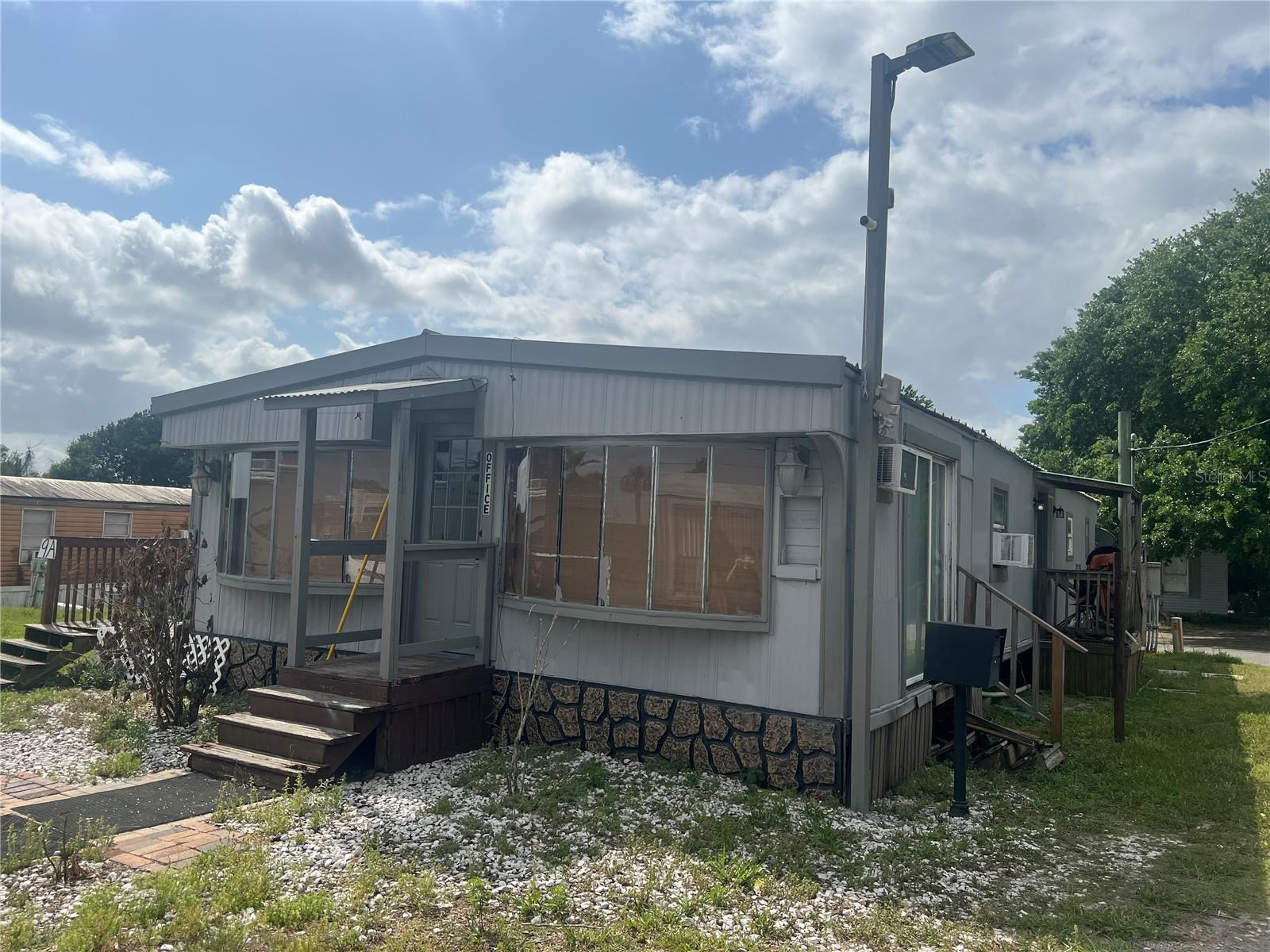 LAKE JOHNS MOTEL APTS. & TR. PK - Residential Income