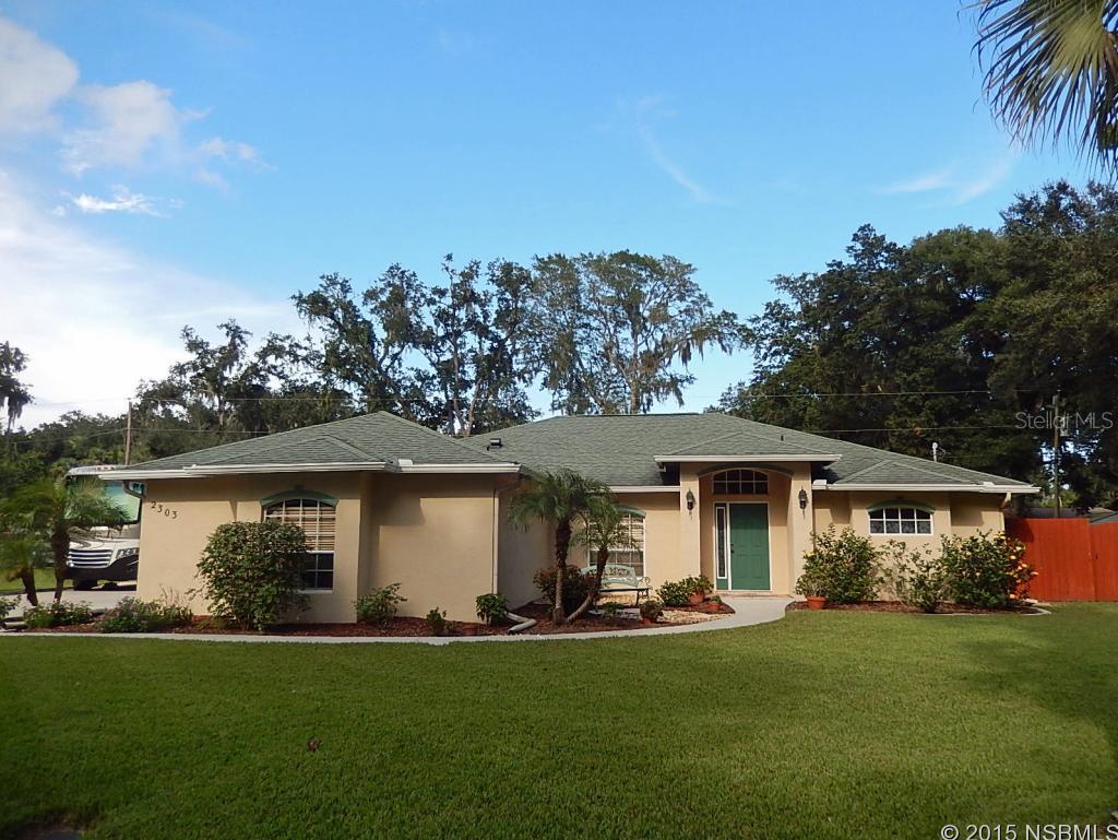 Beautifully spotless home that is a delight to own. Walk into a wide open space overlooking your gorgeous salt system remote control screened pool. Architectural detailing throughout this custom built one owner home. Enjoy the well thoughtout kitchen with stainless appliances & new tile backsplash, breakfast bar with tile kick side, breakfast room overlooking inviting pool & heated spa (buried 100 gal propane tank), sliders open to screened lanai with santia tile, cable & electric. Plumbed for outdoor kitchen. Split BR plan- Master suite has jetted garden tub, separate shower, large walkin closet. Other 2 BR are spacious with large closets. Spectacular landscaping on this triple private corner lot, fenced, room for RV with 30 amp service, shed with 60 amp electric, large grassed area for fun & games, outdoor shower. Hurricane shutters, new programmable garage door opener 2014, sound surround in GR. Just a gem! ;Water: City