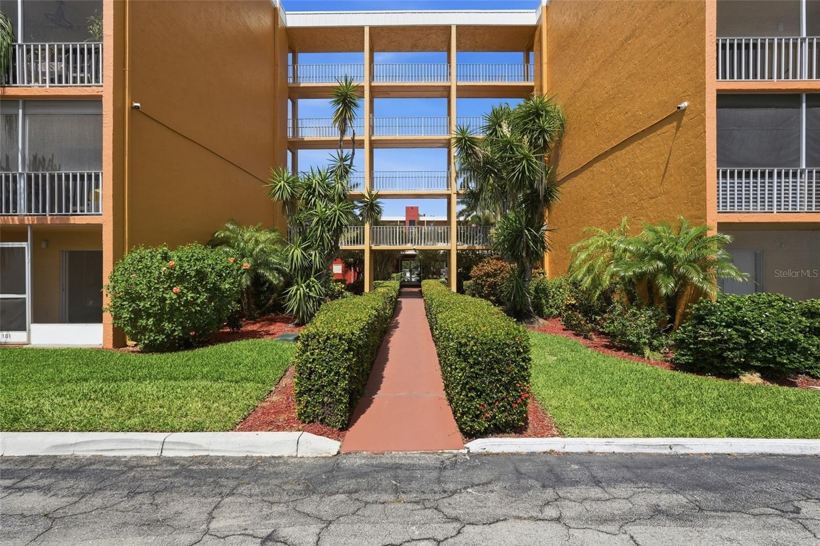 Spacious 4th-floor 2-bedroom, 2-bath condo offering over 1,000 sq ft with a desirable split-bedroom floor plan and beautiful updated flooring throughout. Enjoy peaceful courtyard and partial pool views from the screened balcony, creating the perfect spot to relax and unwind. This move-in ready unit features a bright and open living and dining area and is conveniently located directly across from the elevator, laundry room, and trash chute for easy everyday living. The well-maintained community offers residents access to a clubhouse, community pool, grilling area, elevator access, and assigned parking. Located in the heart of Fort Myers, just minutes from Edison Mall, Bell Tower Shops, dining, shopping, RSW Airport, and I-75. Ideal for seasonal residents, investors, or buyers looking for affordable Florida living with great potential. Motivated seller, bring all offers!