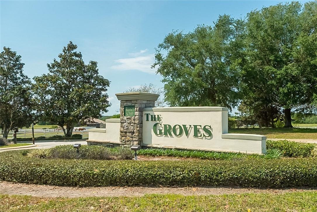 Located at the top of a quiet cul-de-sac within the gated, equestrian-friendly luxury community of The Ranch Club, in The Groves at The Pointe. This 5.25-acre homesite offers approximately 4.25 acres of buildable lands with approximately 1.0 acres non-buildable, providing natural privacy and buffer. Surrounded by multi-million-dollar estate residences, the property allows one primary residence with additional outbuildings permitted. Buyers choose your own builder with no minimum time-frame to construct. Community has riding trails, access to skiable Lake Morgan with community boat ramp and dock, fishing, and the Palatlakaha River which accesses the Clermont Chain of Lakes. Enjoy the scenic sunset and sunrise views, and the peace and quiet. Estate-scale homesites throughout. Minimum build is 2600sf. Horses and up to two head of cattle are permitted.Conveniently located approximately three miles to US-27 and five miles to Florida’s Turnpike, offering a balance of privacy and accessibility.