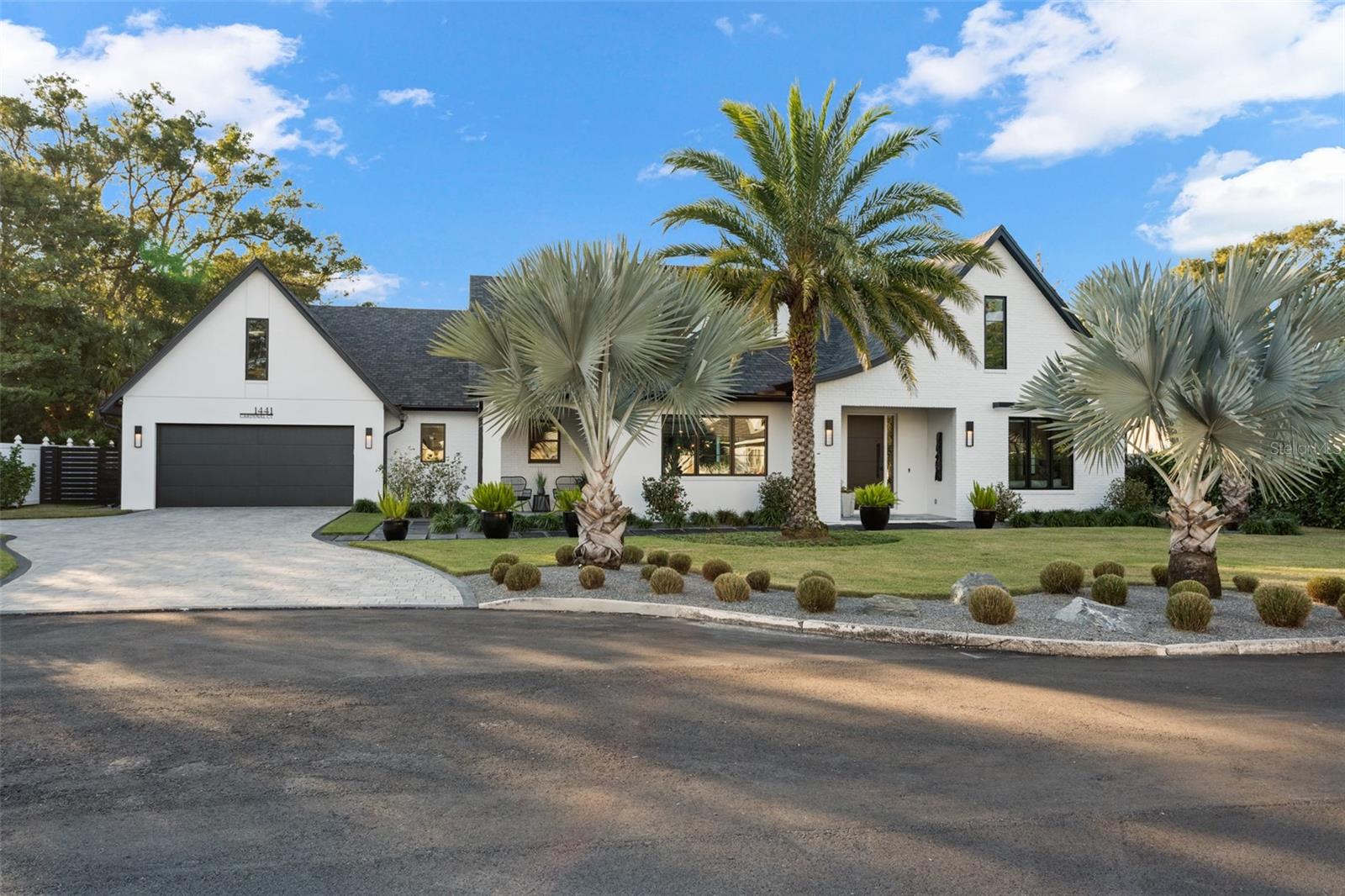 In the heart of Winter Park, Elegant, Immaculate, Stunning, One of a Kind…the list could go on & on. Welcome to the house that has absolutely “everything.” This one-story, newly constructed 2022 custom masterpiece, nestled at the end of a private cul-de-sac, has a modern, transitional & timeless style that appeals to anyone & everyone. Enjoy the combination of luxury, the highest quality finishes and a cozy & comfortable warmth that always feels like “home.” While this house is made for entertaining family & friends, it is also premierly located behind the renowned Enzian movie theater & less than 1 mile from Winter Park Village where you can enjoy a plethora of shopping, phenomenal restaurants and entertainment. Additionally, it is situated in the highly-coveted Dommerich school district offering A-rated educations for all families. If the sun is too much, just press your remote control and lower your electronic shades. If the mosquitos come out at night, don’t worry, just turn on your mosquito mister. When it’s unusually cold outside, just turn on your wall-mounted space heaters on the outdoor covered lanai. If you are thirsty, grab some wine from the kitchen wine refrigerator, pour yourself a beer from the summer kitchen keg or grab a soft drink from one of the 4 refrigerators. Enjoy the detached Fitness building with full gym equipment set up, powder bath & steam shower. If you prefer to swim laps, turn on your Badu Swim Jet Pool System & swim as many laps as like against the current. You have 4,060 SF which includes 4 Bedrooms (all en-suites with customized closet systems), 5 full baths, a powder bath, Bonus Room with built-in Office, large utility room with custom doggie area, huge gourmet Kitchen overlooking the family room, dining room and pool area along with an additional Chef’s Kitchen complete with sink, refrigerator & dishwasher. Additionally, the oversized 2 car garage does not disappoint with it’s industrial epoxy floor, custom wall & cabinet storage, incredible dog wash area, side door access to outside and access to a special attic storage under AC. No detail has been overlooked in this beauty from custom built-ins throughout, unique accent walls and metalwork, spectacular light fixtures, 3 sets of Nano Doors for indoor/outdoor living, the finest building materials, including luxurious engineered hardwood floors and the highest-end appliances including 2 WOLF ovens, SubZero refrigerator & Wine Refrigerator and so much more. Enjoy your wood-burning fireplace inside or your gas fire pit outside where you can add an above ground hot tub if you choose with the pre-wire already in place. There is a dedicated speaker for the fire pit area and surround sound speakers throughout. You will appreciate the curb appeal of this home from the outside with its clean, manicured, simplicity and ease of maintenance. No mowing in the back as it is all beautiful, artificial turf that stays green and manicured year-round. Not only does this home offer privacy, it also offers safety with it’s Simply Safe alarm system which includes 3 surveillance cameras (2 outside, 1 inside), window sensors, motion sensors, glass breakage alarms and a doorbell camera. Enjoy NO HOA and no water bill for irrigation with your own private well. This home also has underground utilities which is a bonus when Mother Nature comes around. Too many amazing components and features of this home to list here so come and see what could be your Dream Home!