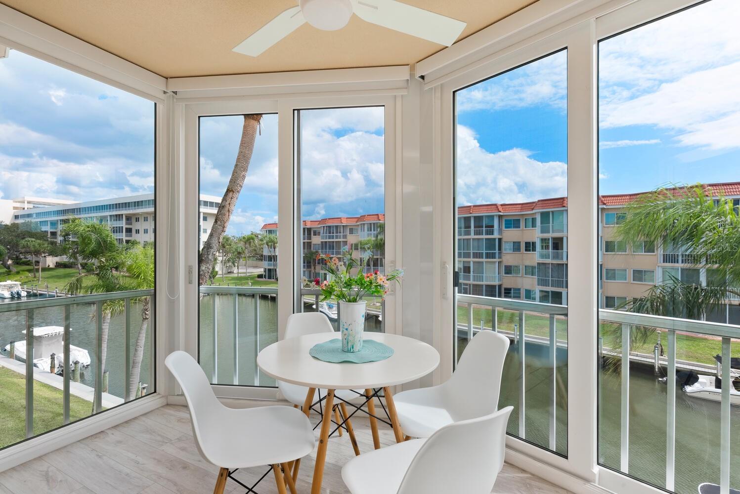Looking for a home for your boat, a beach lifestyle, or an investment? Enjoy sunrises over the marina, afternoons on Siesta Key Beach, and evenings on your enclosed balcony overlooking the boats and colorful skies. This furnished 1BR/2BA condo in Siesta Harbor is beautifully updated with an open floor plan, luxury vinyl flooring, remodeled kitchen (2022) with white shaker cabinetry, granite counters, glass backsplash, peninsula seating, and stainless appliances. Bathrooms feature quartz vanities and tiled showers; guest bath includes a soaking tub. Impact windows, same-floor laundry, and private storage add convenience. Siesta Harbor, a 55+ community, offers private beach access, heated pool/spa, lush landscaping, fishing pier, and a full calendar of social activities. Dock leases may be available for boats up to 30’. Additional amenities include covered parking, on-site manager, and a new roof (2025). Ideally located off the South Bridge near dining, shops, and the free Siesta Key trolley, this turnkey condo is perfect as a vacation retreat, full-time residence, or investment.
