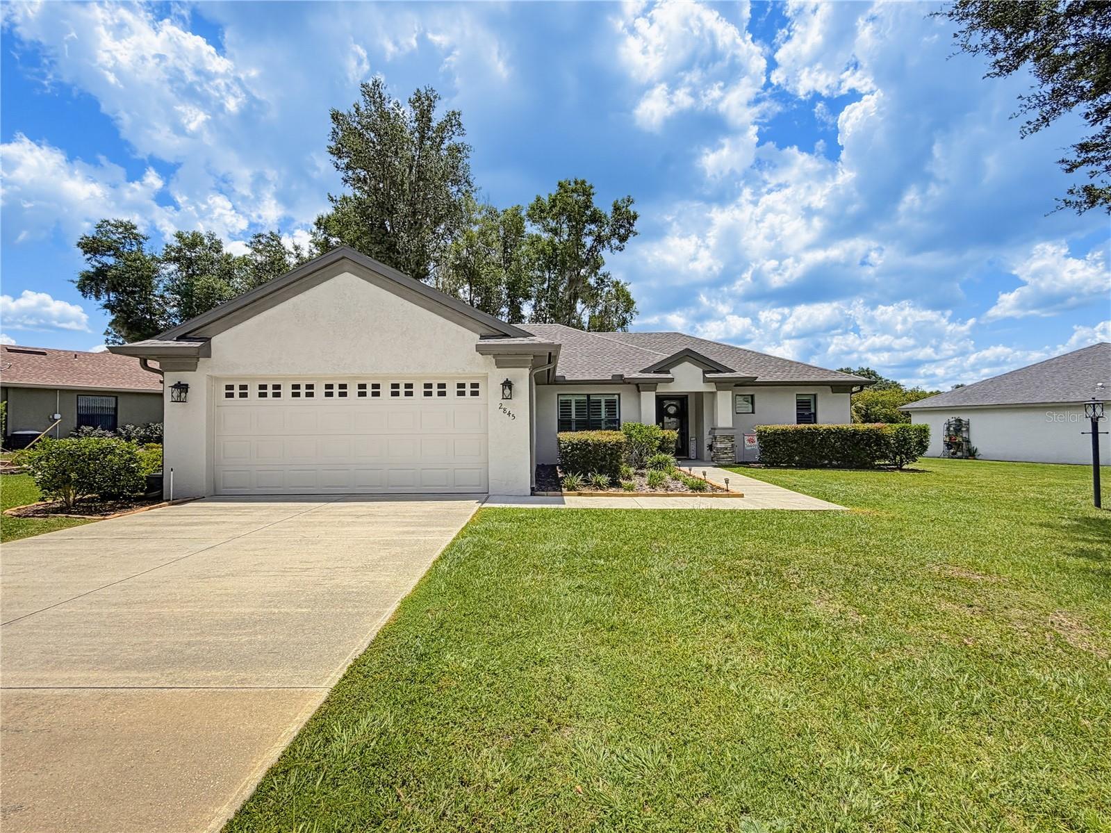 Welcome to this beautifully maintained 2020 home in the sought-after Canterbury Lake Estates community of Citrus Hills. Offering 1,659 square feet of living space (2,355 total), this thoughtfully designed open plan features 3 bedrooms plus a dedicated office, 2 bathrooms, and a 2-car garage, all situated on an oversized one-third-acre homesite with attractive landscaping. This floor plan works great for both everyday living and entertaining. The well-appointed kitchen showcases gorgeous granite countertops, a propane gas range, 2024 stainless steel appliances, soft-close cabinetry, a large pantry, recessed lighting, and a bright breakfast nook. Plantation shutters throughout the home add timeless elegance and privacy. The spacious primary suite offers a relaxing retreat with a walk-in closet, dual sinks, and a beautifully tiled walk-in shower. The guest bathroom also features granite countertops and quality finishes. Additional highlights include a laundry room with storage and a stainless steel sink, abundant natural light, and tasteful finishes throughout. Step outside to enjoy the large screened lanai overlooking the beautifully landscaped backyard, complete with an additional concrete patio—perfect for grilling, outdoor dining, or simply relaxing while enjoying Florida’s beautiful weather. Living in Citrus Hills means embracing an exceptional resort-style lifestyle. Residents enjoy access to championship golf courses, resort-style swimming pools, a full-service spa, state-of-the-art fitness centers, tennis and pickleball courts, walking trails, clubhouses, restaurants, social clubs, arts and crafts workshops, live entertainment, and an extensive calendar of activities and events designed to keep you as active and engaged as you choose. Conveniently located near shopping, medical facilities, parks, the Gulf Coast, and the natural beauty of Citrus County, this home offers the perfect combination of luxury, comfort, and an unmatched Florida lifestyle. Don’t miss this opportunity to make this exceptional home your own!