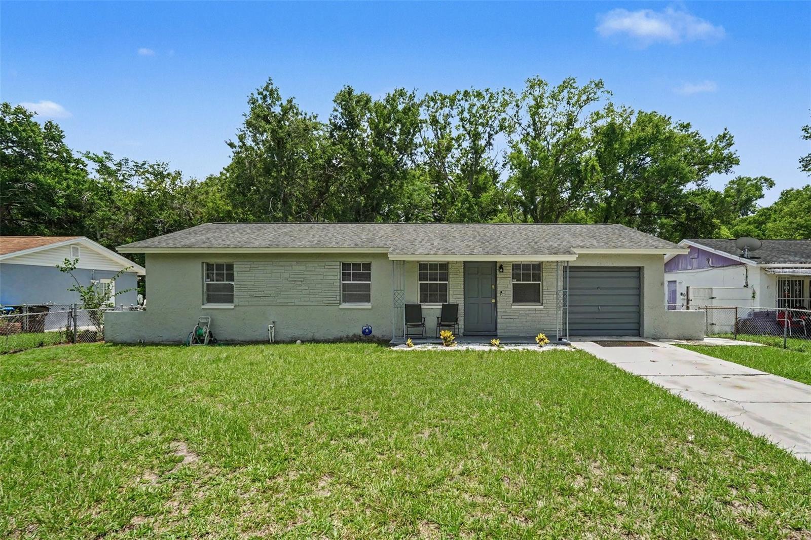 NO FLOOD ZONE | MOVE-IN READY | PERFECT FIRST HOME OR INVESTMENT OPPORTUNITY!

Welcome to this charming 3-bedroom, 1.5-bath block home offering the perfect combination of affordability, convenience, and location. Whether you're a first-time home buyer, looking to downsize, or searching for a great investment property near the University of South Florida, this home checks all the boxes.

Inside you'll find an updated kitchen featuring granite countertops, newer cabinetry, a dishwasher, and a bright eat-in dining area with brand-new tile flooring. The spacious living room and hallways showcase durable laminate flooring, while the beautifully renovated full bathroom adds a fresh, modern touch.

Step outside and enjoy a generous backyard overlooking peaceful water views—perfect for relaxing after a long day, entertaining friends and family on the deck, fishing from your own backyard, or giving kids and pets plenty of room to play.

Constructed of durable block construction and located in a NO FLOOD ZONE, this home offers added peace of mind and potential savings on insurance.

Conveniently situated just minutes from USF, Busch Gardens, Adventure Island, Seminole Hard Rock Hotel & Casino, Moffitt Cancer Center, the VA Hospital, shopping, restaurants, parks, and major employers. Commuting is easy with quick access to I-4, I-75, and I-275, placing Downtown Tampa, Ybor City, Tampa International Airport, and countless entertainment options within reach.

Don't miss this incredible opportunity to own an affordable home in one of Tampa's most convenient locations. Schedule your private showing today!