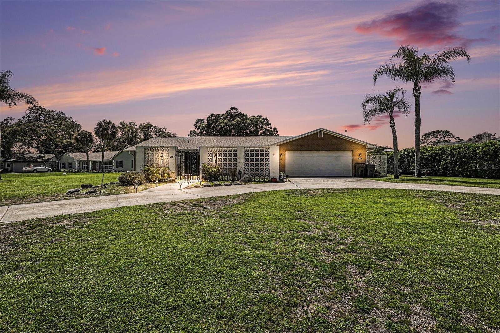 MUST SEE! This spacious 4-bedroom, 2.5-bath home offers a highly desirable split floor plan, a dedicated office, and plenty of room for both everyday living and entertaining. With two separate living areas, there's ample space for family gatherings, recreation, or quiet relaxation.
The thoughtfully designed layout provides privacy for the primary suite while keeping the additional bedrooms comfortably separated. The dedicated office is perfect for working from home, studying, or creating a flexible bonus space to fit your needs.

Step outside and enjoy the large screened porch overlooking the fully fenced backyard—an ideal setting for year-round outdoor living. A welcoming front porch and private courtyard add charm and curb appeal.

A standout feature of the property is the versatile backyard shed complete with electricity and air conditioning, making it perfect for a workshop, hobby room, home gym, storage, or additional workspace.

Major updates have already been completed, including the roof, windows, and A/C system, providing added peace of mind for the next owner.

Situated on a corner lot near a cul-de-sac, this home offers a convenient location close to shopping, dining, schools, beaches, and major roadways. Combining comfort, functionality, and value, this property is ready to welcome you home.

Schedule your showing today!