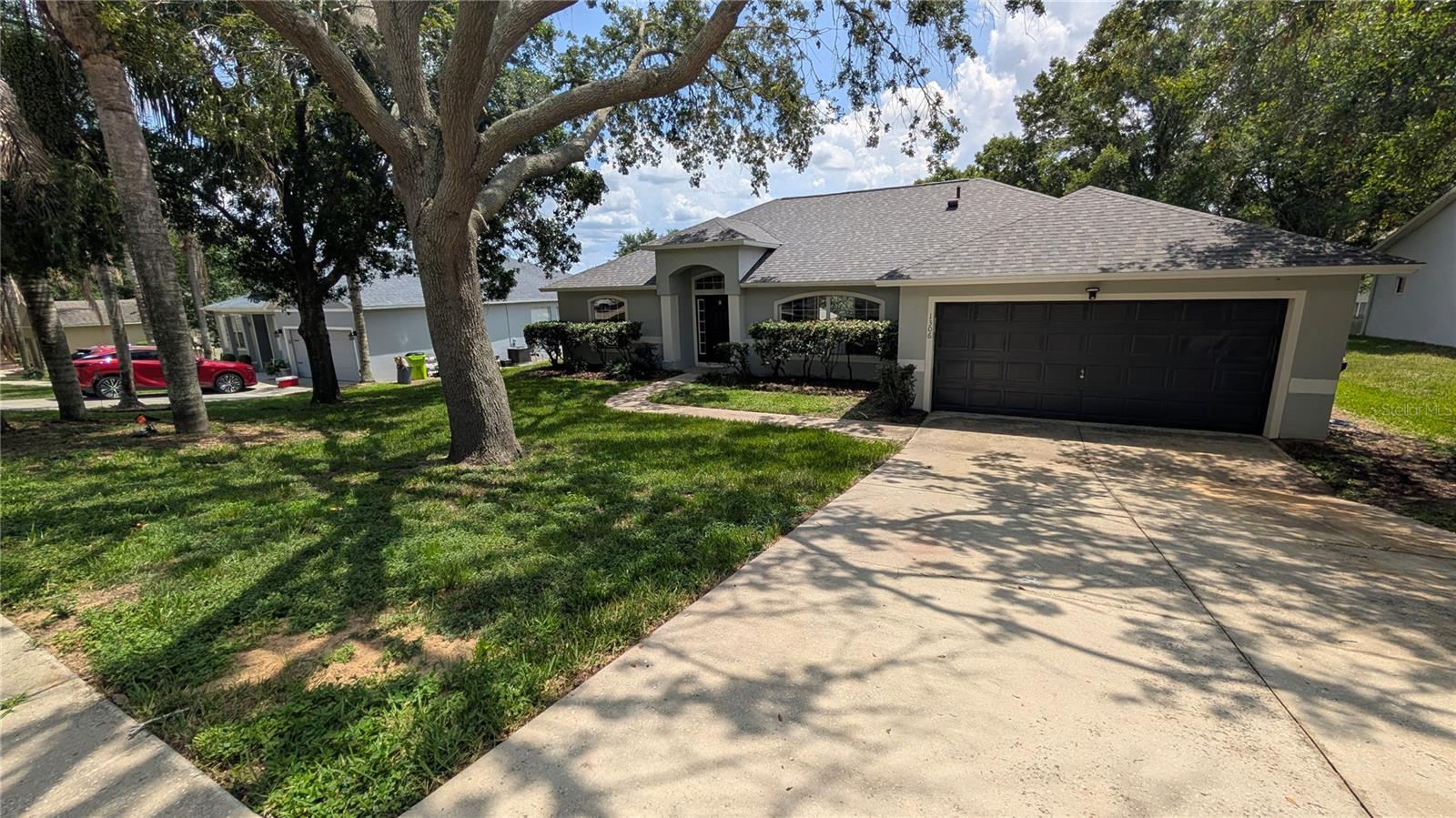 BRAND NEW ROOF – JUNE 2026! Welcome home to this charming 3-bedroom, 2-bath residence nestled in the desirable Oak Valley community of Minneola, just north of Clermont. Offering 1,870 square feet of thoughtfully designed living space, this home combines comfort, functionality, and an unbeatable location with all with the added benefit of a low HOA.
From the moment you step inside, you're greeted by vaulted ceilings and an open-concept floor plan that creates a bright, spacious atmosphere. The seamless flow between the living, dining, and kitchen areas makes everyday living and entertaining effortless. A dedicated office/den provides the perfect space for working from home or a quiet retreat. 
The split-bedroom floor plan offers added privacy, with the spacious primary suite featuring a walk-in closet and an en-suite bathroom complete with a relaxing garden tub. Two additional bedrooms and a full guest bathroom are situated on the opposite side of the home, making it ideal for family or visitors.
Built in 2002 with solid block and stucco construction, the home includes central air conditioning, public utilities, and high-speed internet availability, everything you need for modern, comfortable living. 
Perfectly located near Lake Minneola, Waterfront Park, the South Lake Trail, downtown Clermont, shopping, dining, healthcare facilities, and the Florida Turnpike, you'll enjoy convenient access to Orlando while embracing the relaxed lifestyle and natural beauty of Lake County.
Just minutes away, Historic Downtown Clermont offers waterfront dining, unique boutiques, a weekly Farmers Market, and year-round community events, including Pig on the Pond, Red Hot & Boom, Caribbean Jerk Festival, Art & Jazz, Trunk or Treat, and festive holiday celebrations.
Whether you're searching for your first home, a growing family home, or a smart investment, this property offers the perfect combination of space, comfort, convenience, and the welcoming charm that makes South Lake County one of Central Florida's most sought-after places to call home.