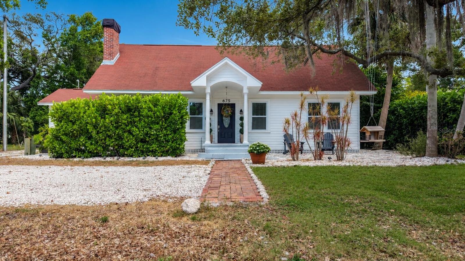 Welcome to Crystal Beach! A rare opportunity to own a piece of Old Florida two blocks from the Gulf of Mexico! Built in 1935 and completely updated, this 3 bedroom, 3.5 bath home has endless charm! 675 Vincent has original hardwood floors throughout, crown molding, a wood-burning fireplace for colder days, and a dream oasis in the backyard for endless Florida warmth. The kitchen is complete with cabinets, crown molding, beautiful granite countertops, stainless steel appliances, and a huge chef's pantry. The second-story primary suite contains an office (or second den), an extended primary closet, and an updated bath with an oversized shower. The main level brings a large family room with an adjacent dining room, two additional bedrooms, two full baths (one shower, one freestanding tub), and an office/study. The home is set back off of Vincent Street, on a quarter-acre lot. The backyard oasis, complete with a salt-system pool, large gazebo, and pool room with half bath is where your Florida dreams turn into reality. Crystal Beach is a golf cart community with an exceptional location. Ample access to the Pinellas Trail, quaint Crystal Beach Post Office, waterfront shell-path, waterfront park (with fishing piers and kayak/boat launch), endless legendary Gulf sunsets, and extremely close to downtown Palm Harbor's bustling restaurant scene. Also in close proximity are marinas, our Nation's top-rated beaches, and championship golf courses. Palm Harbor is also home to top-rated schools that include Ozona Elementary, Palm Harbor Middle, and Palm Harbor University high school. Homes with this charm, this location, and this town, rarely ever exist! Don't wait! New updates include: New sewer, potable water, and reclaimed water lines (2022). New saltwater pool system (2026). New A/C (2020). New tankless water heater (2026). Newer double-pane windows (2018). This home had no water intrusion or flooding during the 2024 hurricanes.