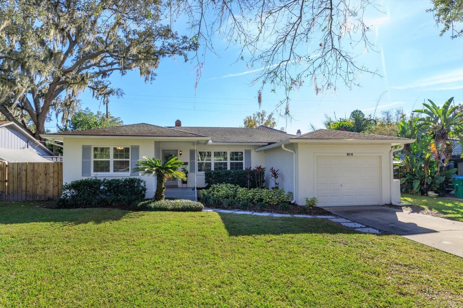 Welcome home to your charming and centrally located Winter Park bungalow. This home is nearby beautiful Mead Botanical Gardens, Rollins College, Park Avenue and the Winter Park Tennis Center. 4-minute drive to Advent Health, I-4, Orlando Museum of Art, Lake Ivanhoe Antique District, and lots more! You will instantly be drawn in by it's stunning curb appeal. This 2 bedroom/ 1 bath (plus an office) home has gorgeous, refinished original hard wood floors, new windows (2022), new exterior paint (2021), new interior paint (2023), fresh landscaping and sod (2021).  A very large screened-in rear patio offers an ideal spot for entertaining and relaxing. Bonus features include a 1-car garage, newer wood fencing (2021), washer and dryer plus a flex room that can be used as an office, den or hobby space.  Roof – 2008, HVAC – 2005, Plumbing main drain replaced in 2019, electrical panel updated in 2004.  Don’t miss out on this affordable home, perfect for you!