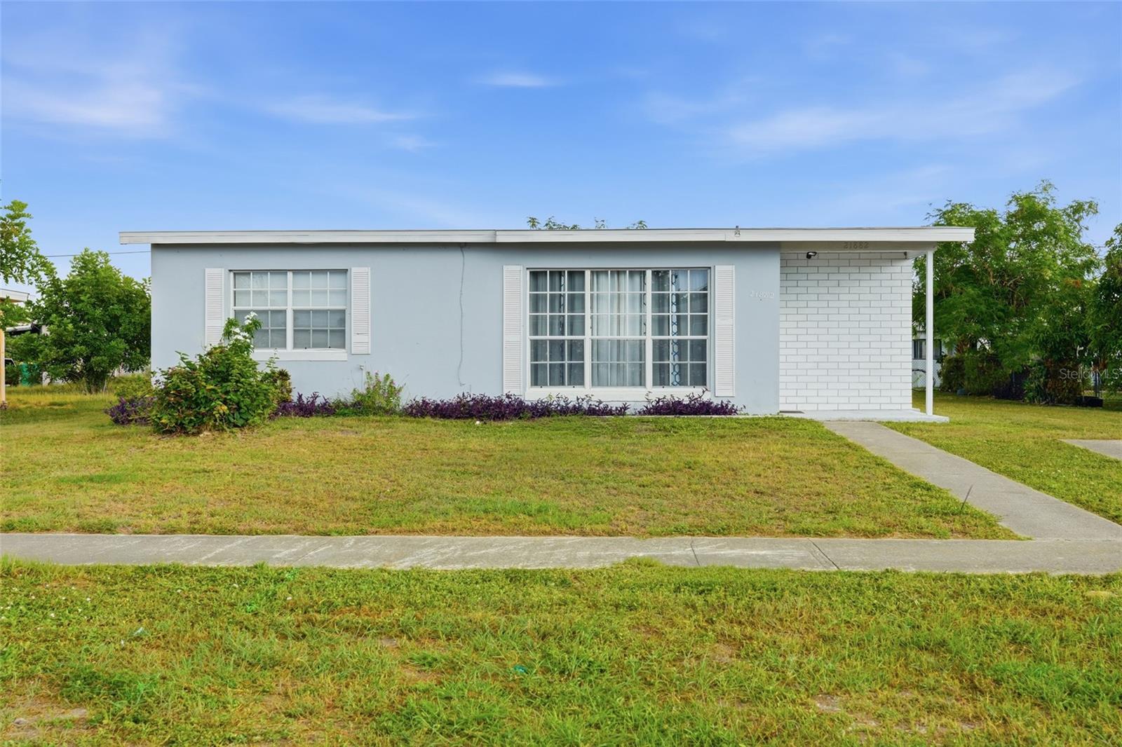 Welcome to 21882 Haines Ave, a beautifully updated 2-bedroom, 1-bath home in the heart of Port Charlotte. This move-in-ready property offers the perfect blend of comfort, style, and value, making it ideal for first-time buyers, seasonal residents, or savvy investors.

Step inside to discover a bright, inviting interior featuring a recently renovated kitchen and bathroom with modern finishes, abundant cabinetry, and easy-care tile flooring throughout. Natural light fills the home, while ceiling fans and updated fixtures add comfort and contemporary appeal to every room.

Enjoy added peace of mind with a brand-new roof installed in June 2026, providing long-term value and protection for years to come.

The spacious laundry room includes washer and dryer hookups, and the versatile bonus room provides endless possibilities as a home office, guest room, hobby space, or den.

Outside, enjoy a generously sized backyard with plenty of room to create your own outdoor oasis. Whether you envision a pool, gazebo, outdoor kitchen, garden, or play area, the possibilities are endless.

Conveniently located near shopping, dining, medical facilities, schools, and major roadways, this property combines everyday convenience with exceptional potential. Whether you're looking for a primary residence, winter retreat, or income-producing investment, this home is a must-see.

Schedule your private showing today and discover all that 21882 Haines Ave has to offer!