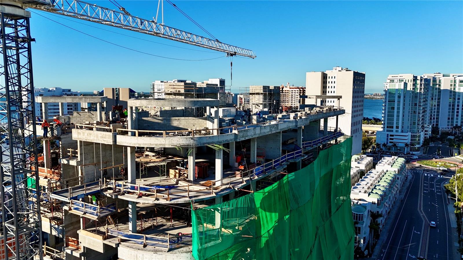 Under Construction. The Edge Sarasota defines urban luxury in the heart of downtown’s vibrant Arts District. Residence D is a stunning 2-bedroom, 2.5-bathroom plus den corner residence offering just over 3,100 sq. ft. of living space with floor-to-ceiling windows and expansive city and bay views spanning from the East to Southeast.

The open-concept design showcases soaring ceilings and a chef’s kitchen featuring Italian cabinetry, Wolf and Sub-Zero appliances, a gas cooktop, and a waterfall-edge island—perfect for entertaining. The owner’s suite is a true retreat, complete with dual walk-in closets, a morning bar, and a spa-inspired bath with dual vanities, a soaking tub, and a glass-enclosed shower. A private terrace, den, and full laundry room with utility sink provide additional comfort and functionality.

Residents at The Edge enjoy an array of resort-style amenities, including a pool deck with hot and cold plunge pools, cabanas, outdoor kitchens, and an owners’ wellness club with a state-of-the-art fitness center, yoga room, infrared sauna, and treatment rooms. Additional spaces include a social lounge, bar, game room, catering kitchen, and private dining room with individual wine lockers.

With only 27 exclusive residences, The Edge offers a boutique downtown lifestyle steps from Sarasota’s acclaimed restaurants, galleries, boutiques, and the Bayfront. Construction is underway, with limited opportunities remaining to personalize interior finishes.

Secure your place at The Edge Sarasota today—where contemporary design meets timeless elegance in one of the city’s most desirable addresses. 

We invite all qualified buyers for a personal hard hat tour. Please call the listing office to schedule your appointment.