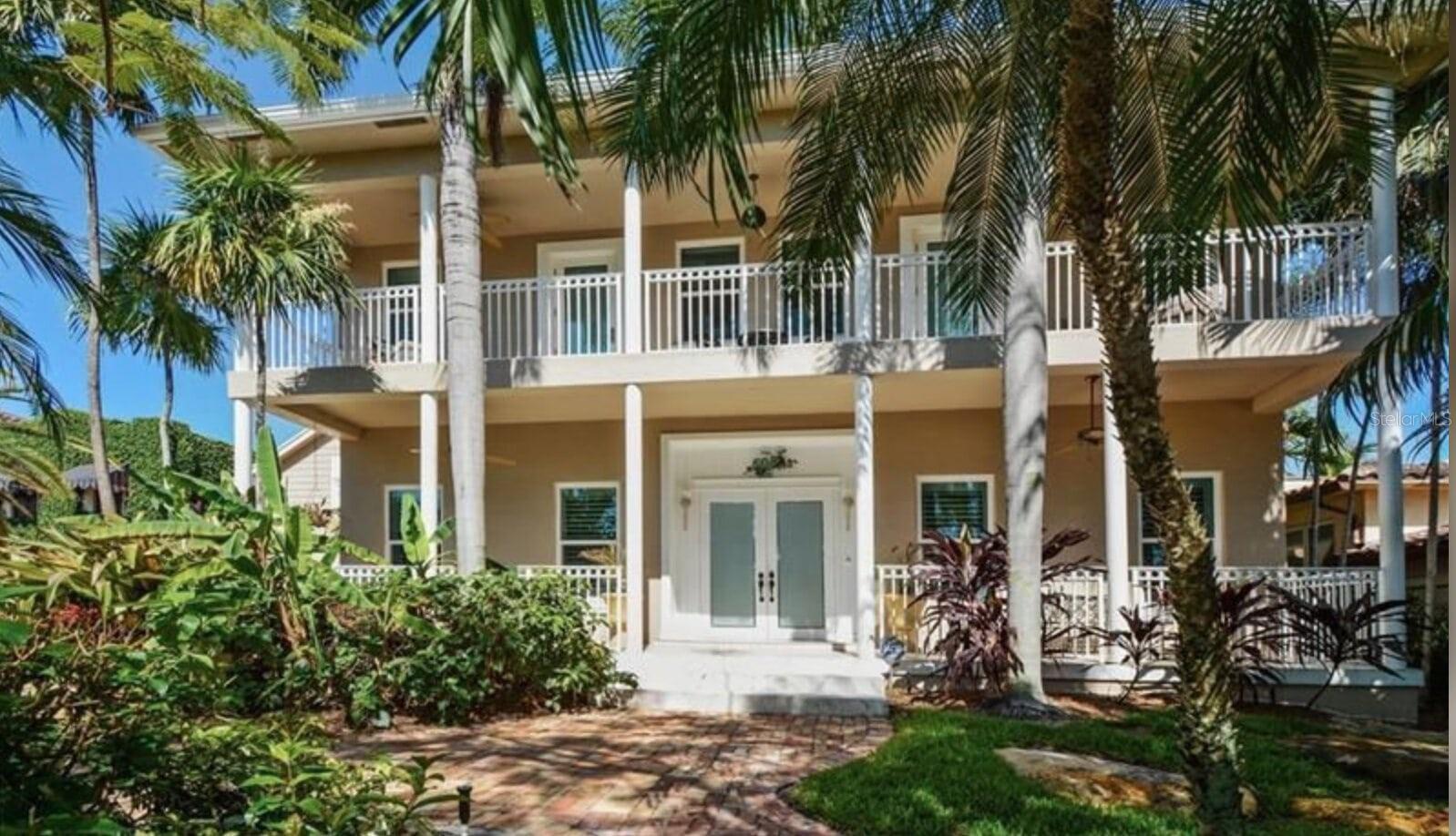 Updated coastal style home with 75' of water frontage, quick & easy ocean access, Marble & hardwood floors, grand staircase w/ 3rd story skylight, double sided fireplace, 1st floor bedroom, spacious master suite, with covered balcony. Spectacular water views.All high impact windows/doors. Separate guest house w, full bath & laundry. Heated pool/spa. Fully fenced with electronic gate and 4 car motor court. 13k lb boat lift on private dock. ;Water: City